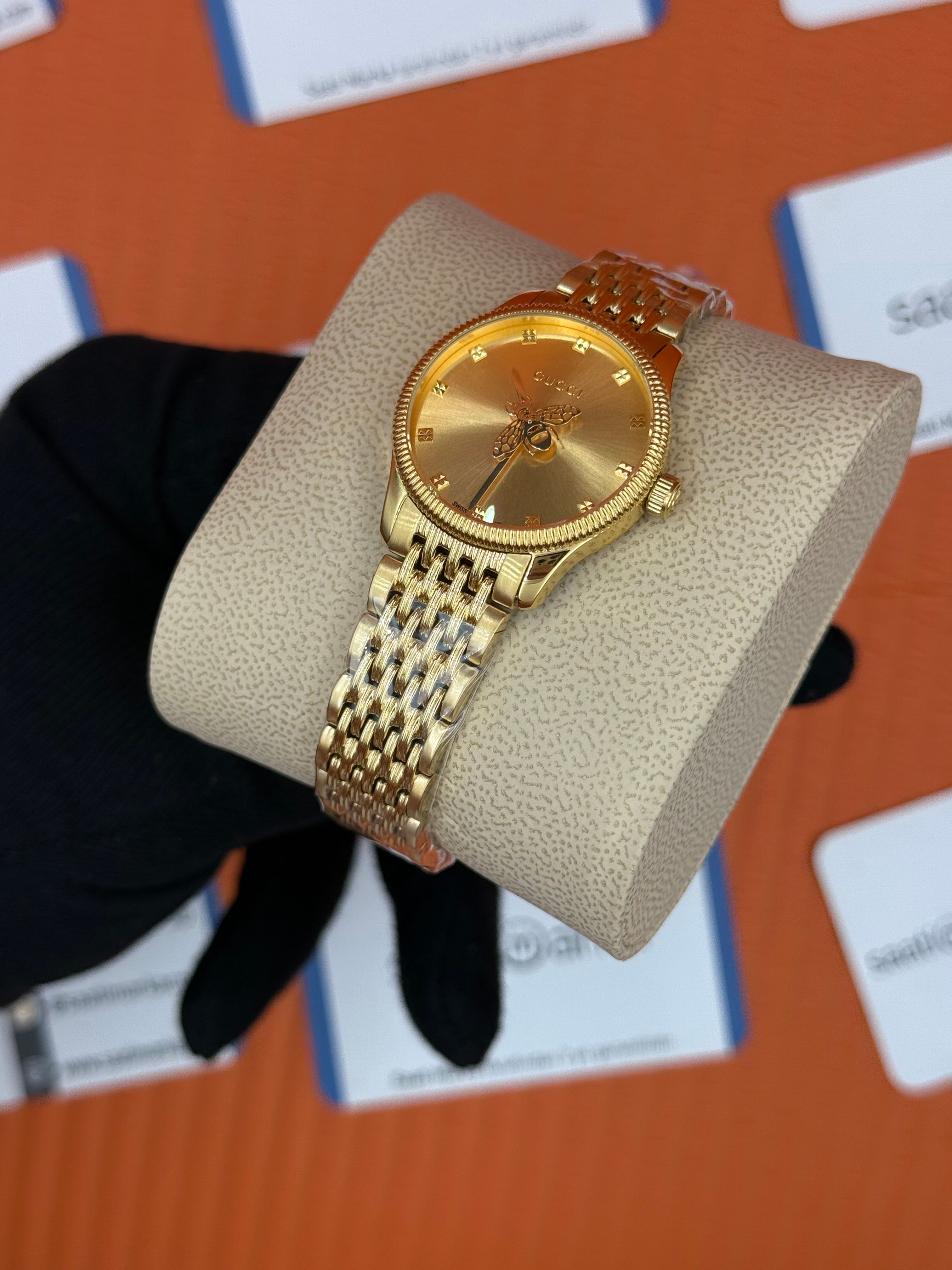 GUCCI şampanya kadran gold kasa kordon kadın kol saati
