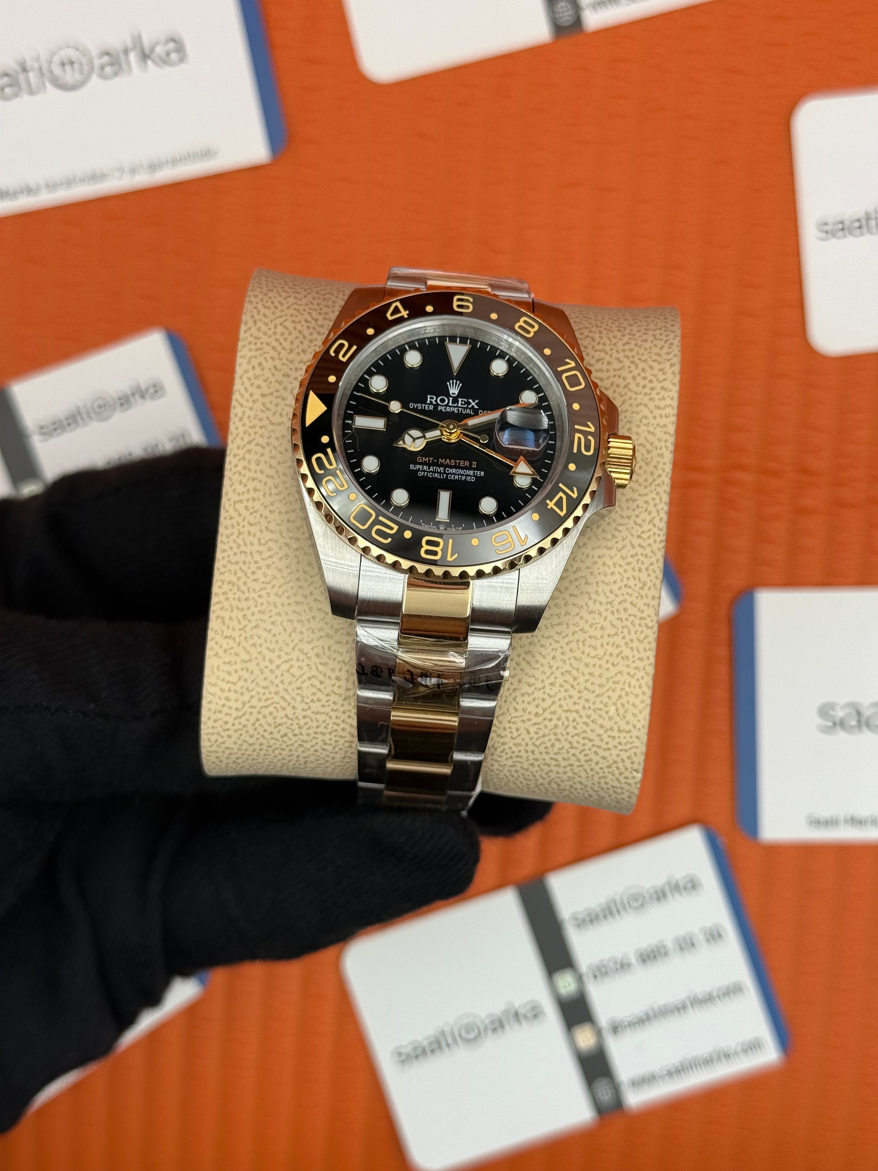ROLEX Gmt Master black dila bezel gold silver kordon 40mm