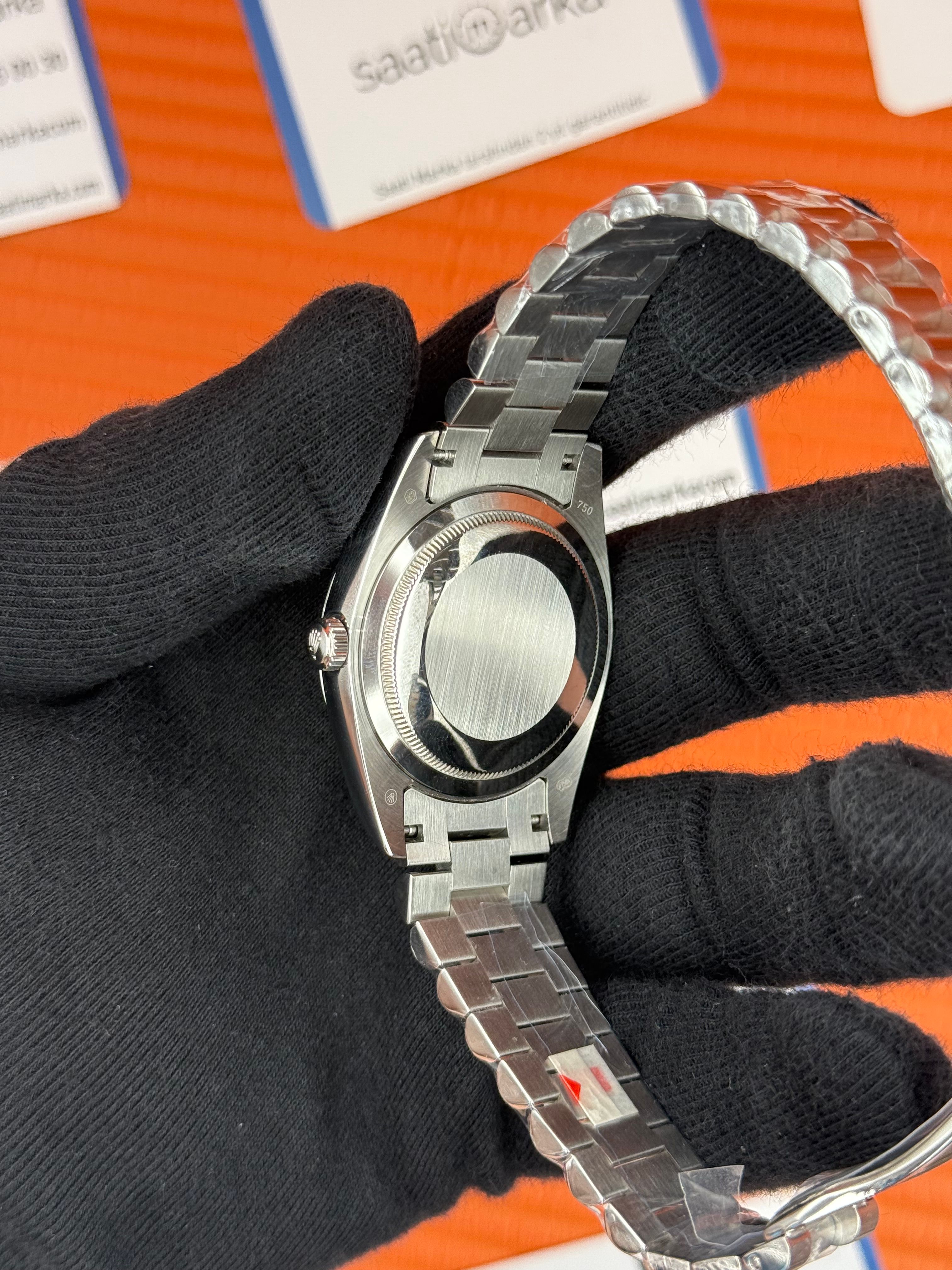 ROLEX Day Date roma rakamlı buz mavisi kadran silver president kordon