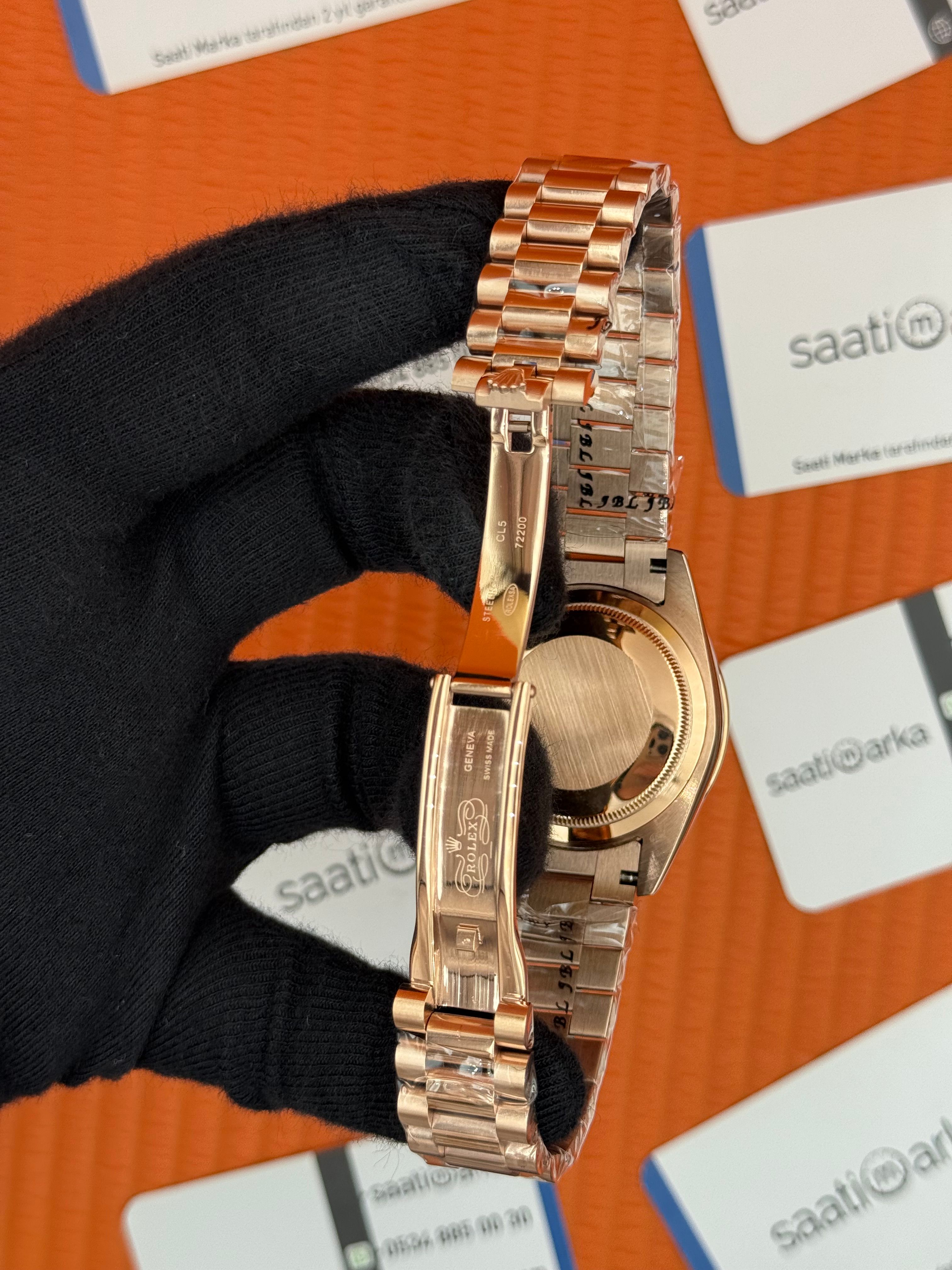 ROLEX Day Date taşlı bezel roma rakamlı gri kadran rose kasa-kordon oyster