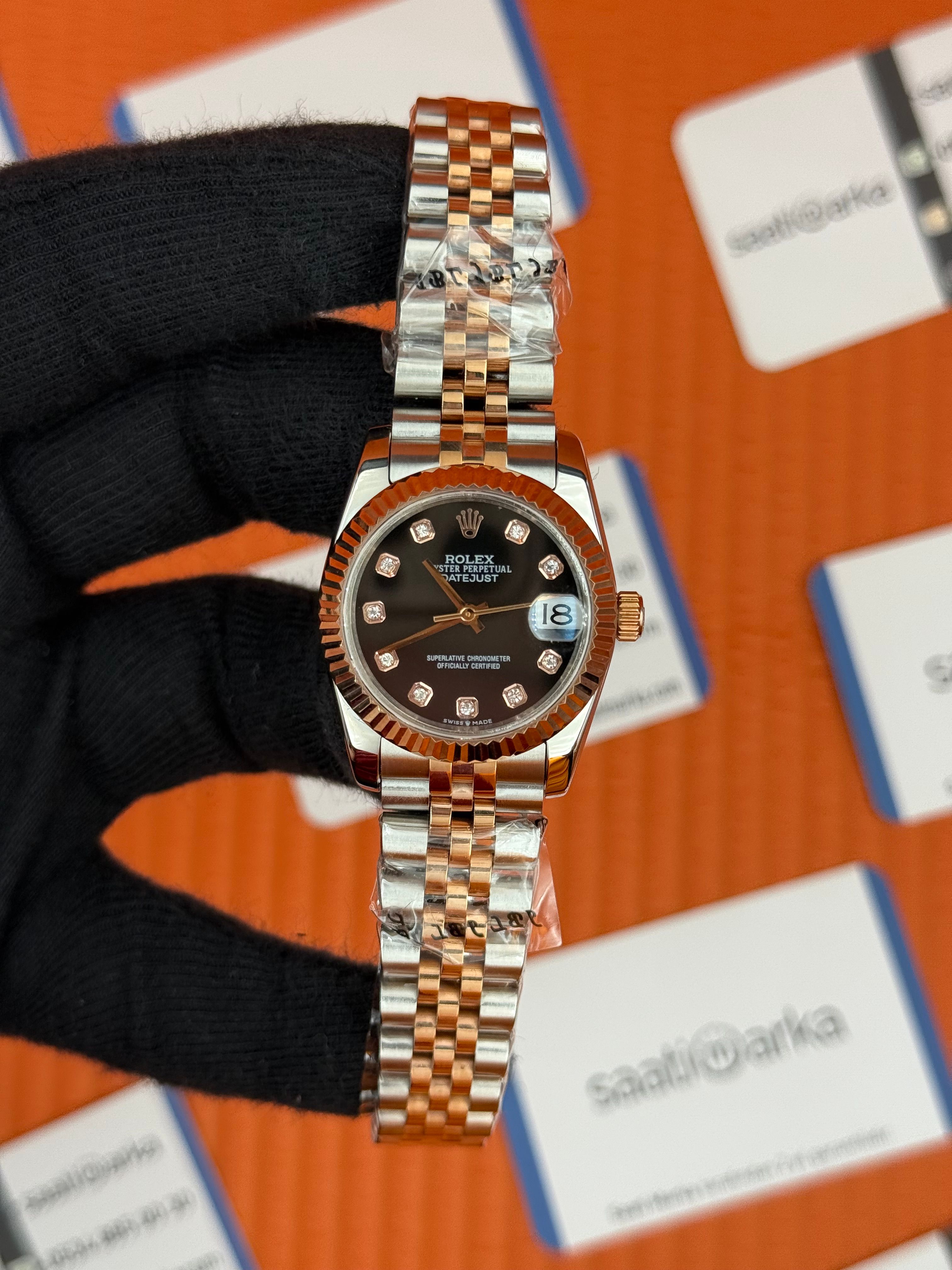 ROLEX datejust 31mm siyah baget taşlı kadran rose silver jubilee kordon