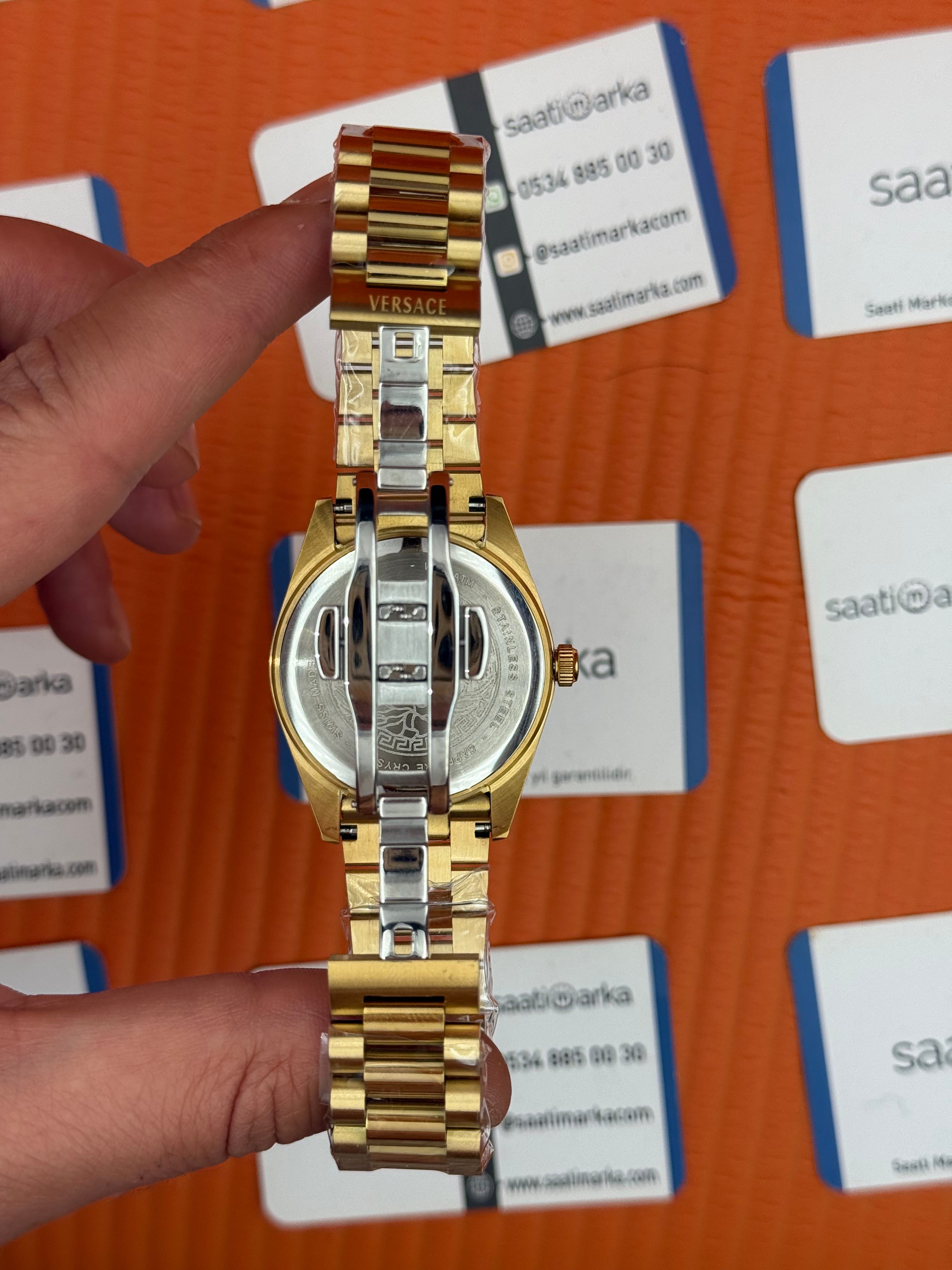 VERSACE 40mm turkuaz kadran gold kasa kordon erkek kol saati