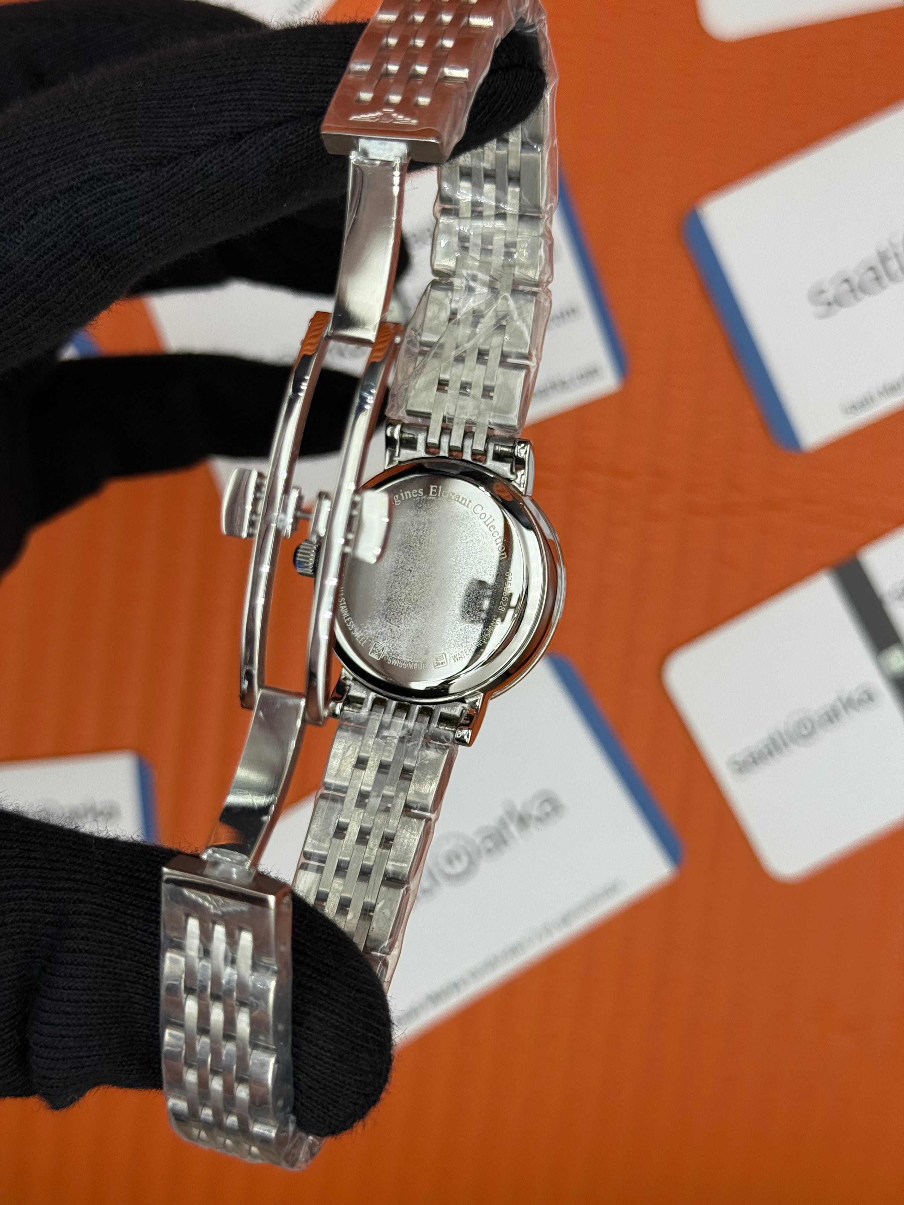 LONGINES L480094876 beyaz baget taşlı kadran silver kasa kordon