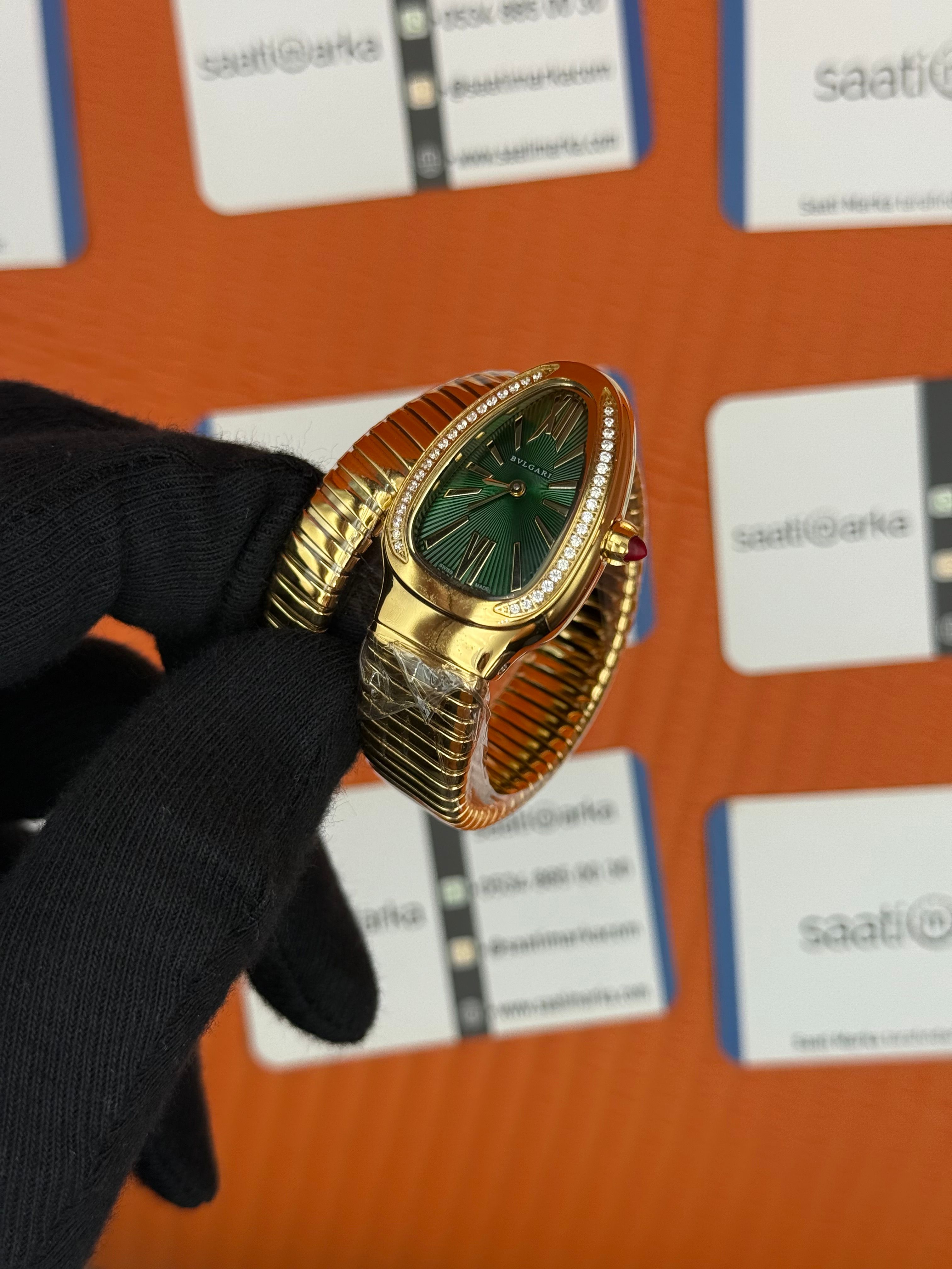 BVLGARİ serpenti tek sarma gold kordon taşlı bezel yeşil kadran kadın kol saati