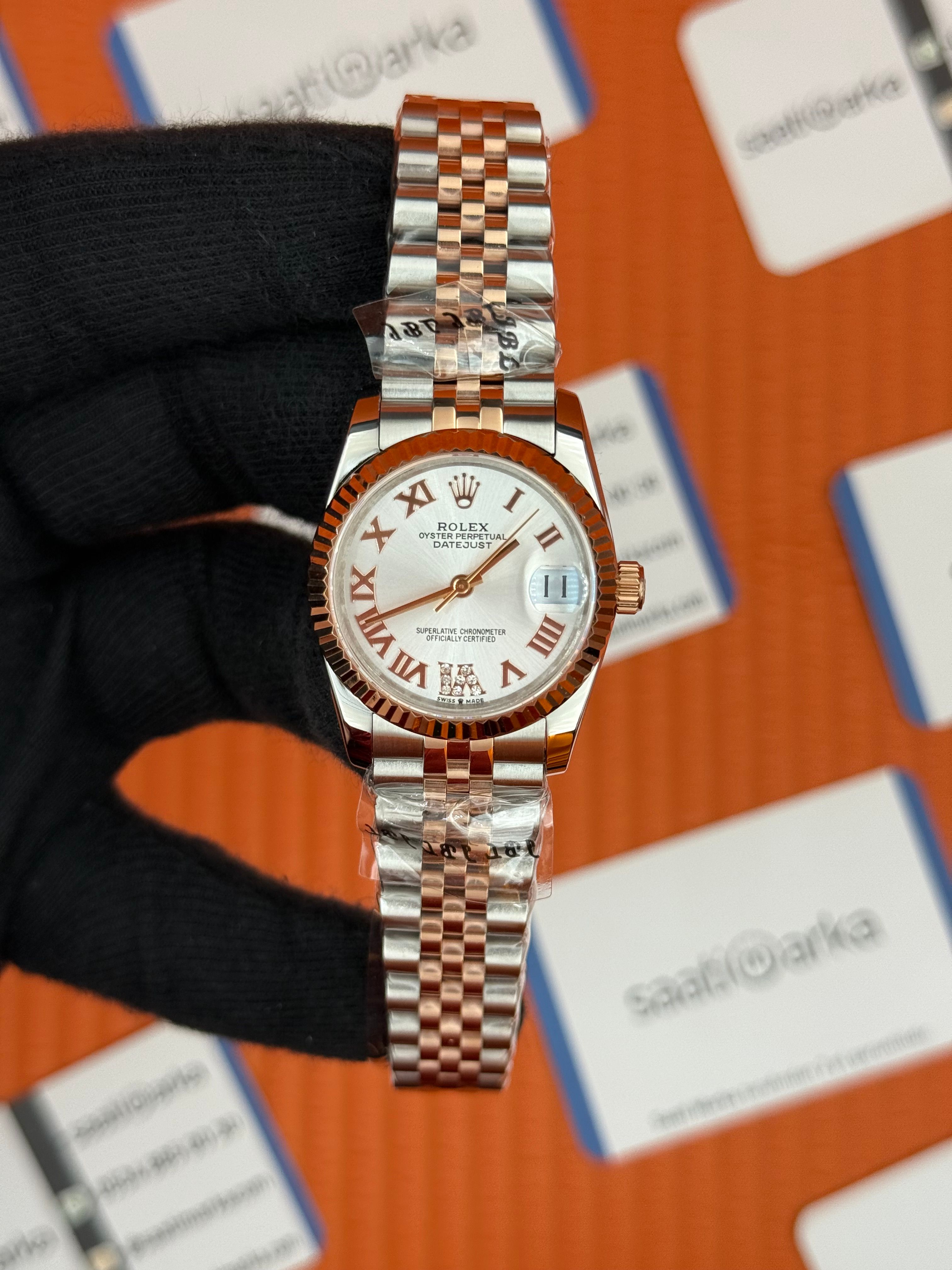 ROLEX datejust 31mm beyaz roma rakamlı kadran rose silver jubilee kordon
