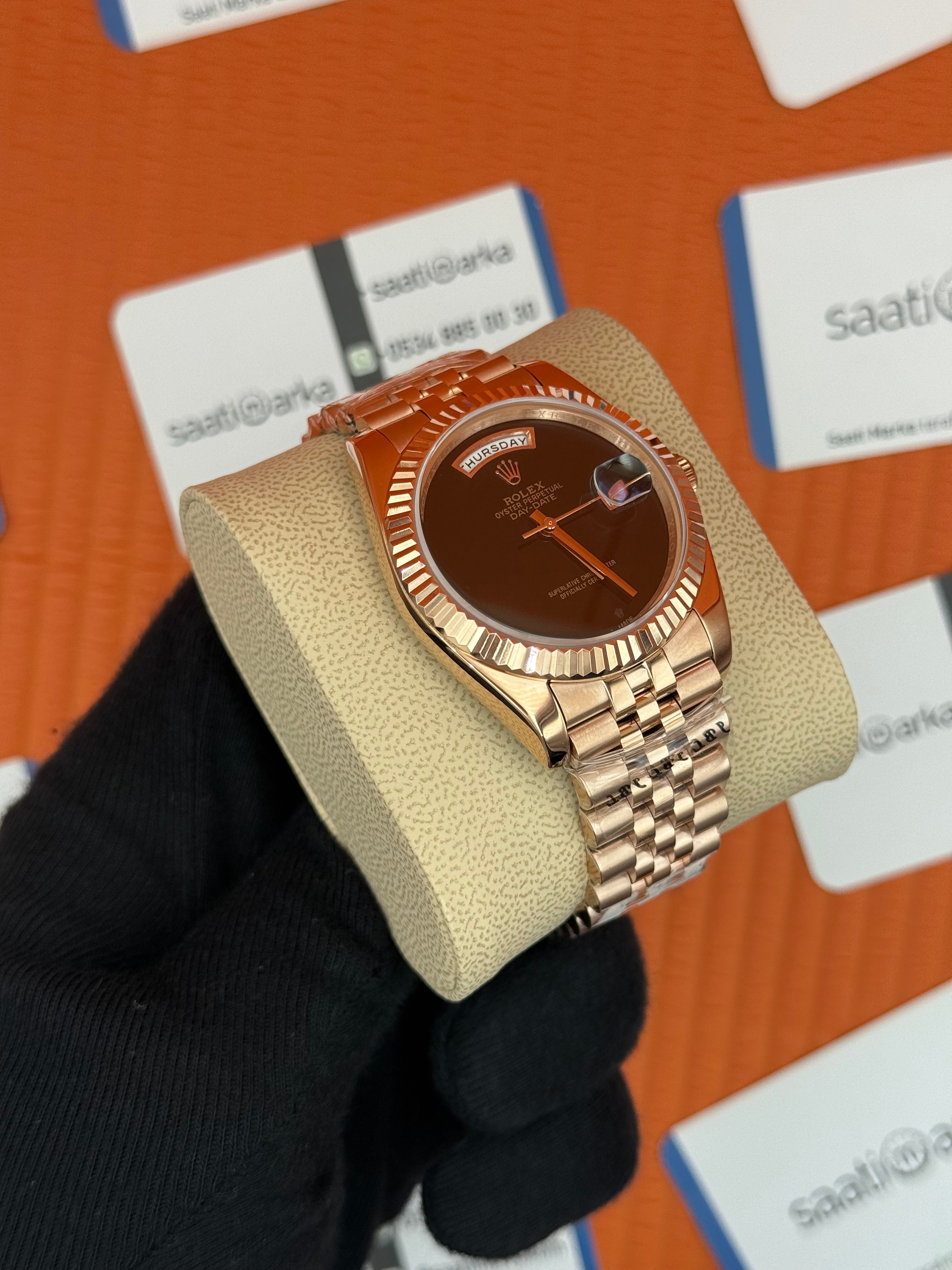 ROLEX Day Date siyah kadran rose kasa-kordon jubilee