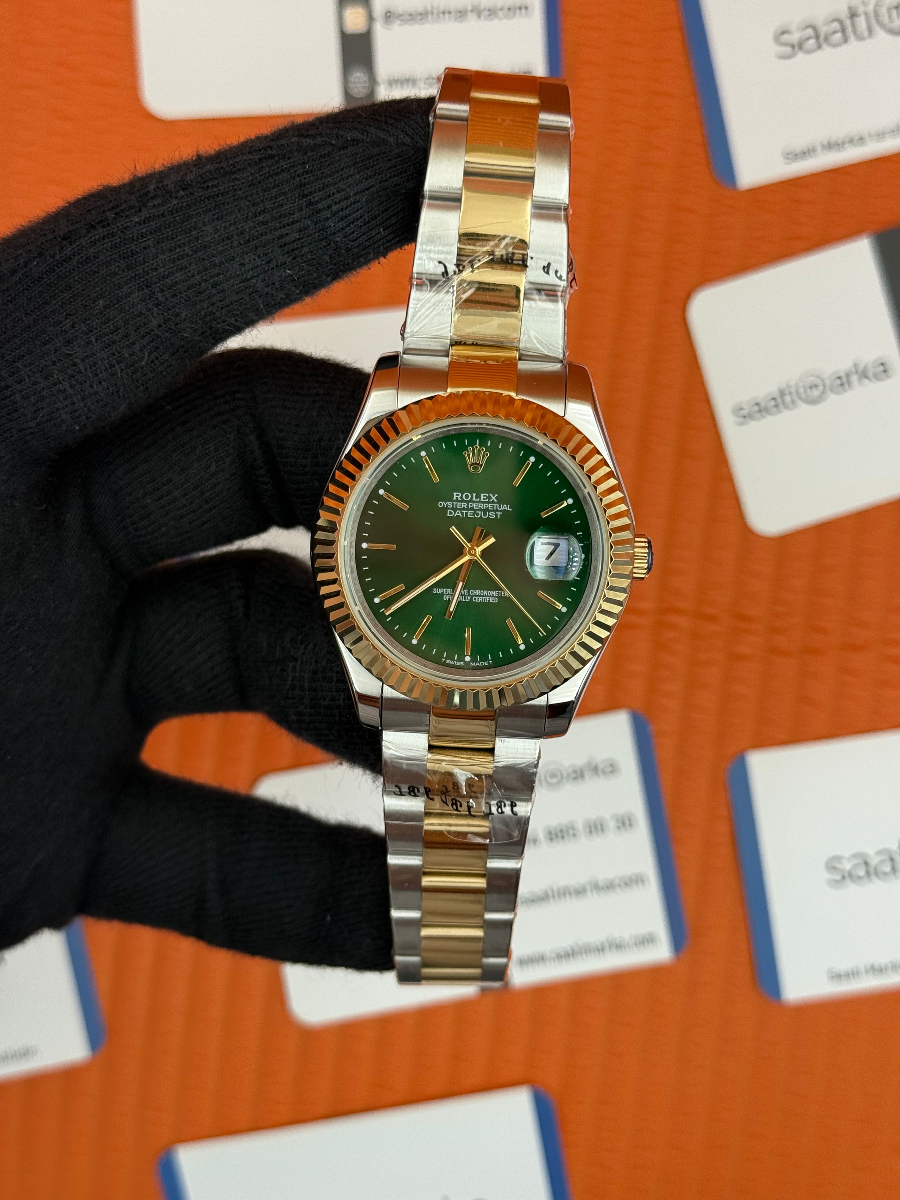 ROLEX Datejust green dial gold-silver oyster kordon
