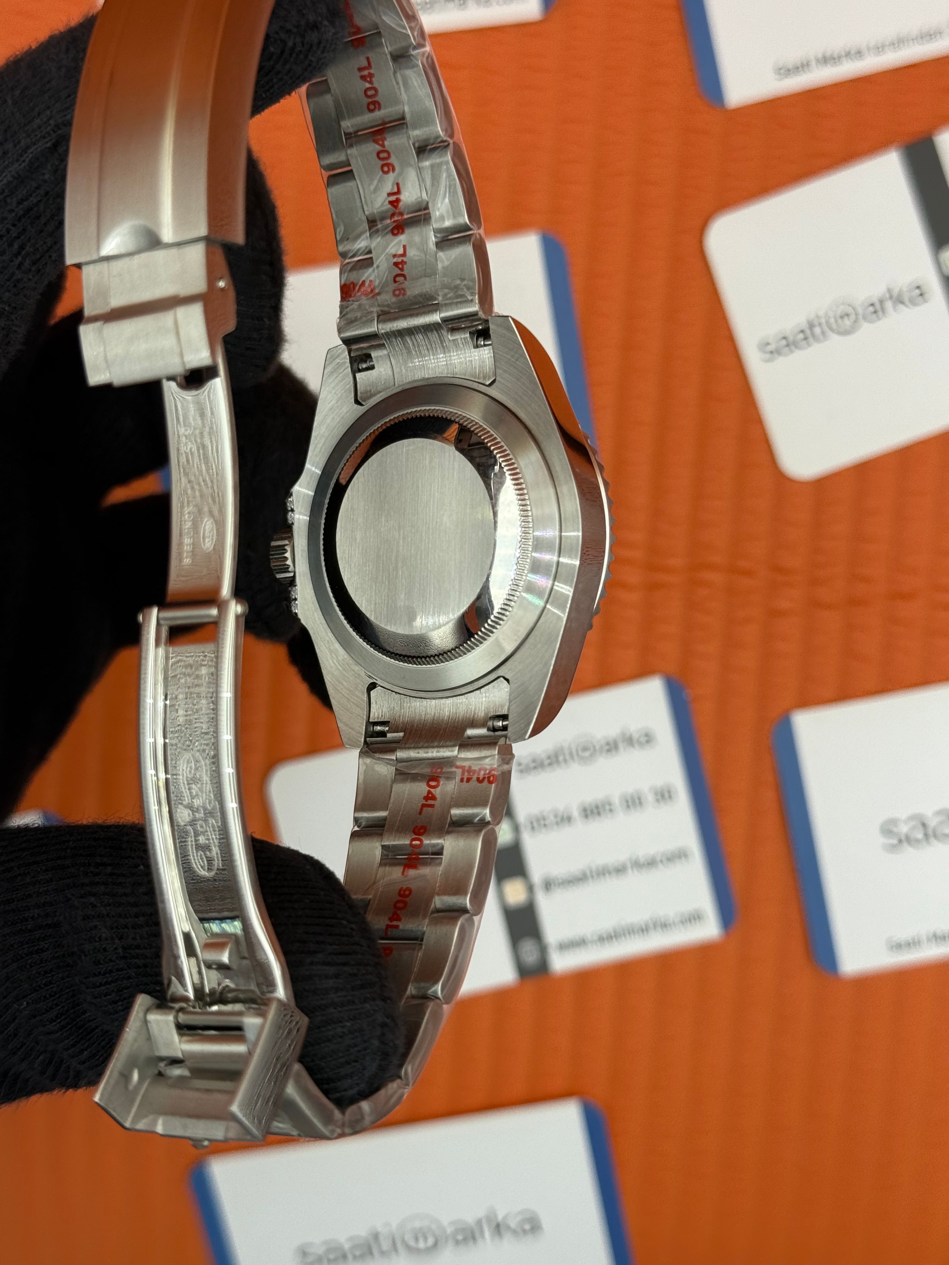 ROLEX Submariner taşlı bezel blue dial silver oyster kordon