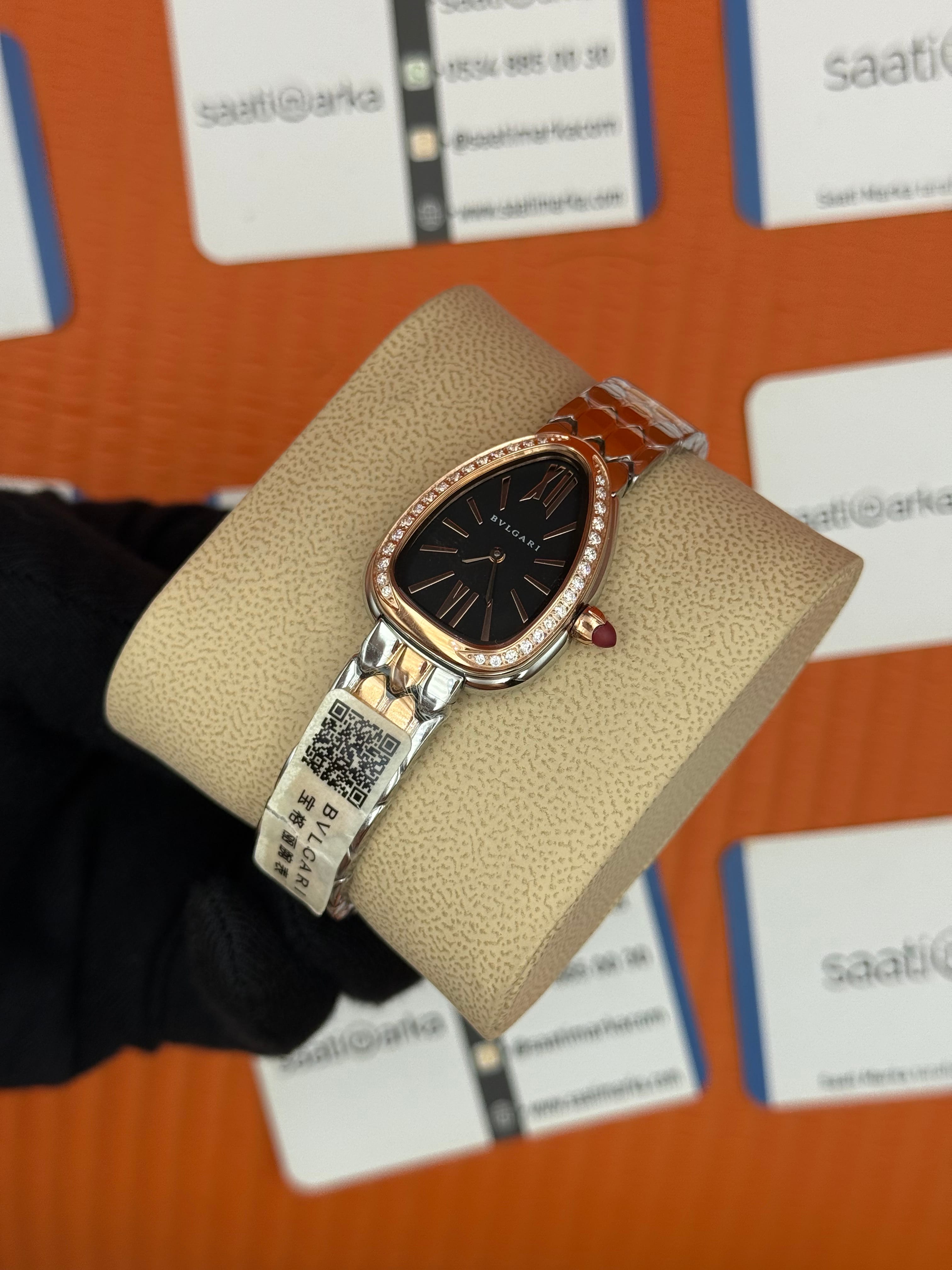BVLGARİ serpenti seduttori taşlı bezel siyah kadran rose kasa kordon kadın kol saati
