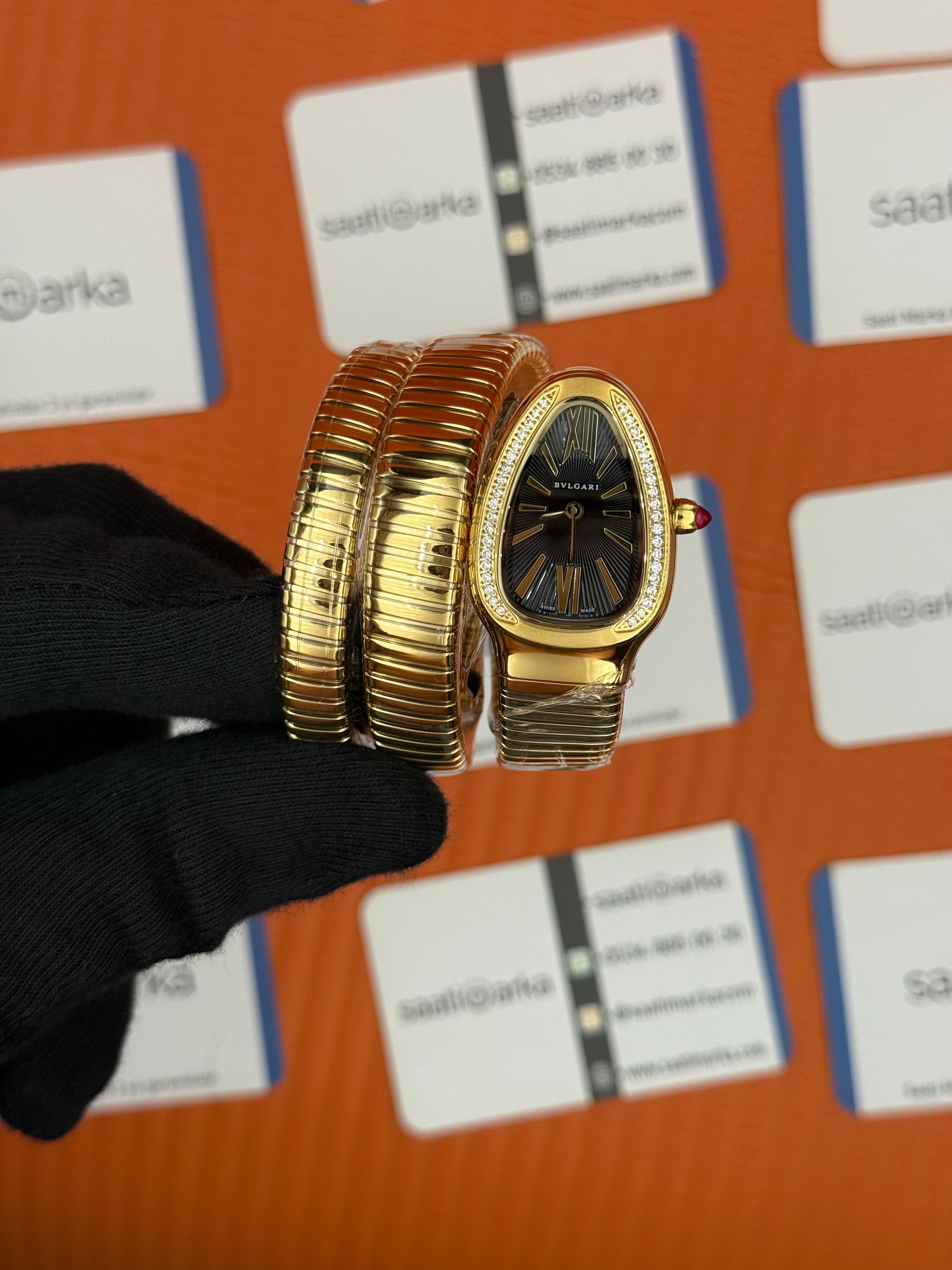 BVLGARİ serpenti çift sarma gold kordon taşlı bezel siyah kadran kadın kol saati