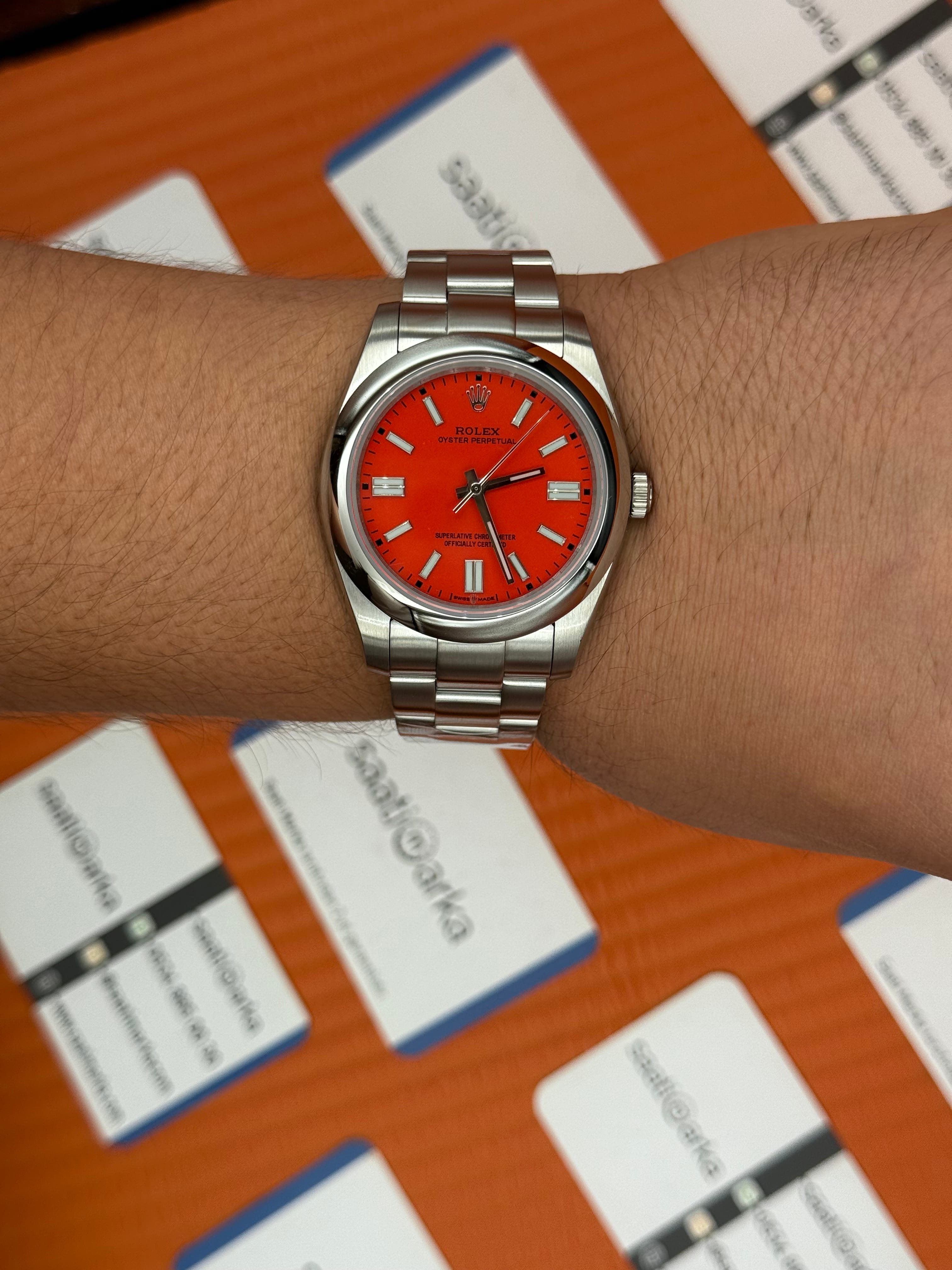 ROLEX oyster perpetual kırmızı kadran silver kasa kordon erkek kol saati