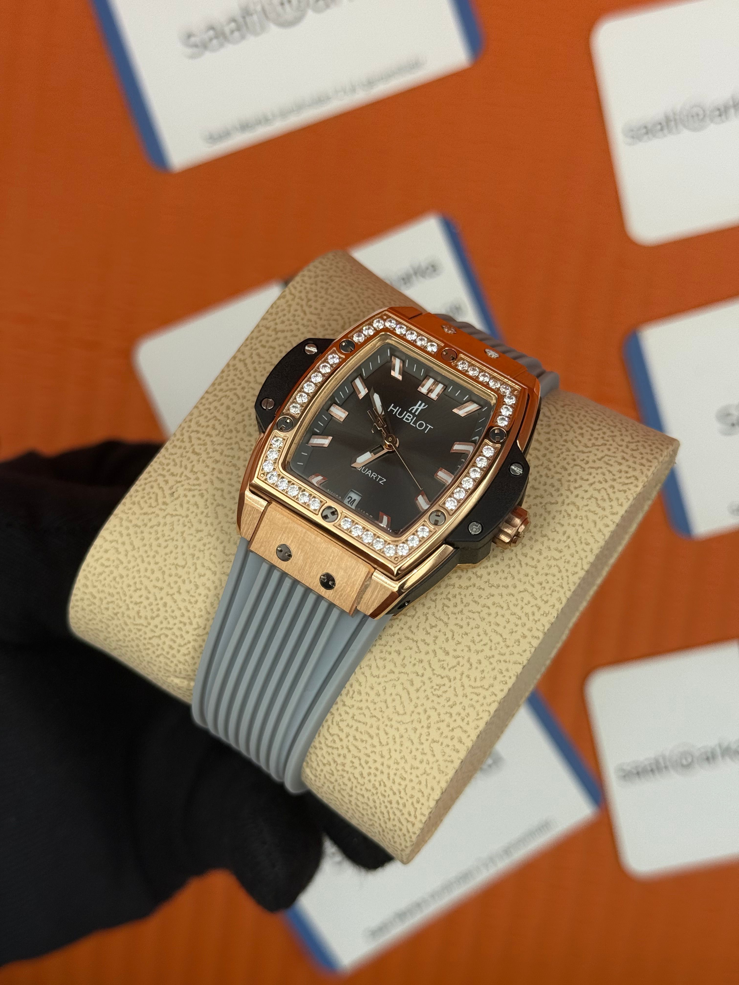 HUBLOT taşlı bezel rose kasa gri kadran gri kauçuk kordon kadın kol saati