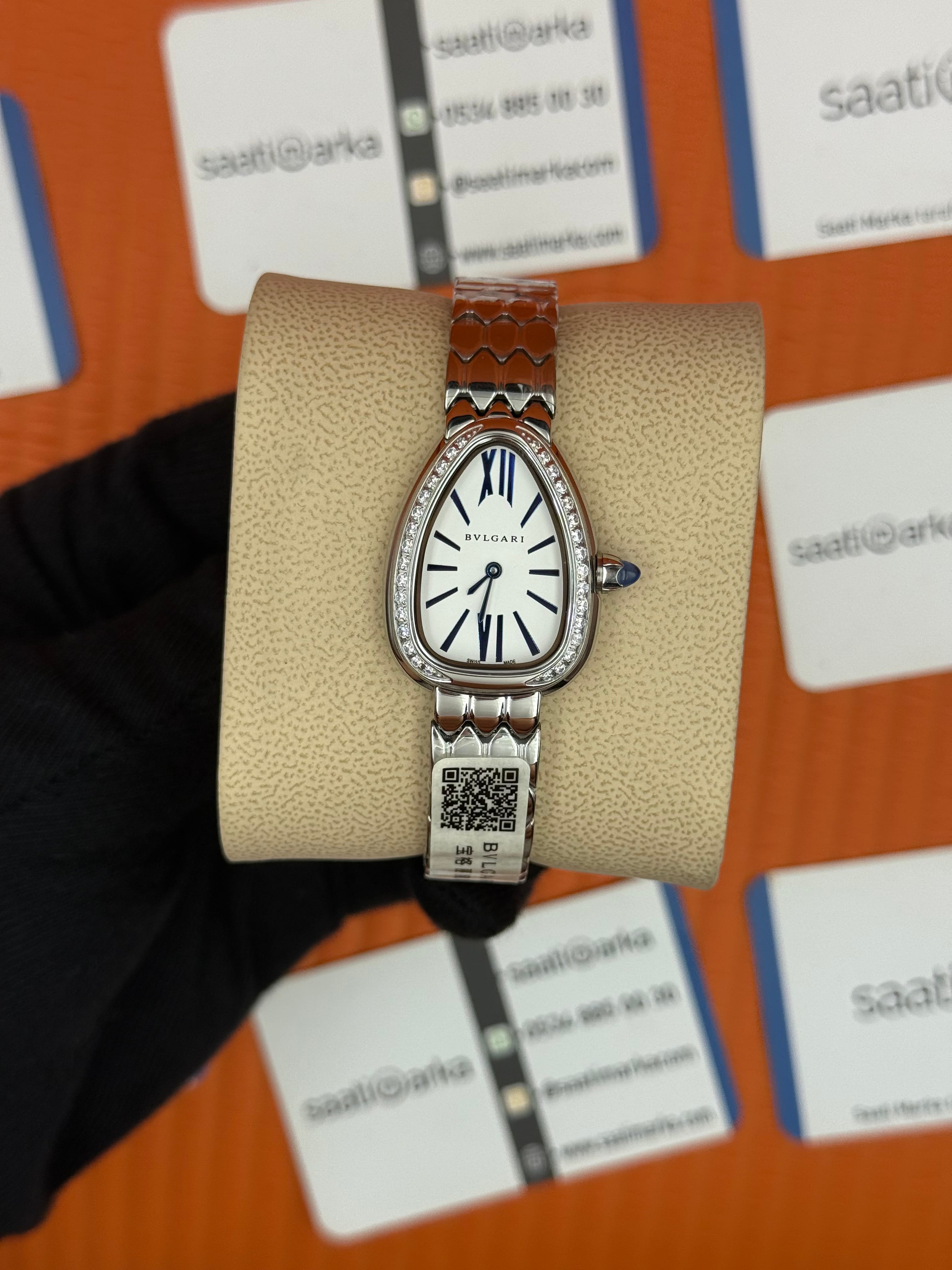 BVLGARİ serpenti seduttori taşlı bezel beyaz kadran silver kasa kordon  kadın kol saati