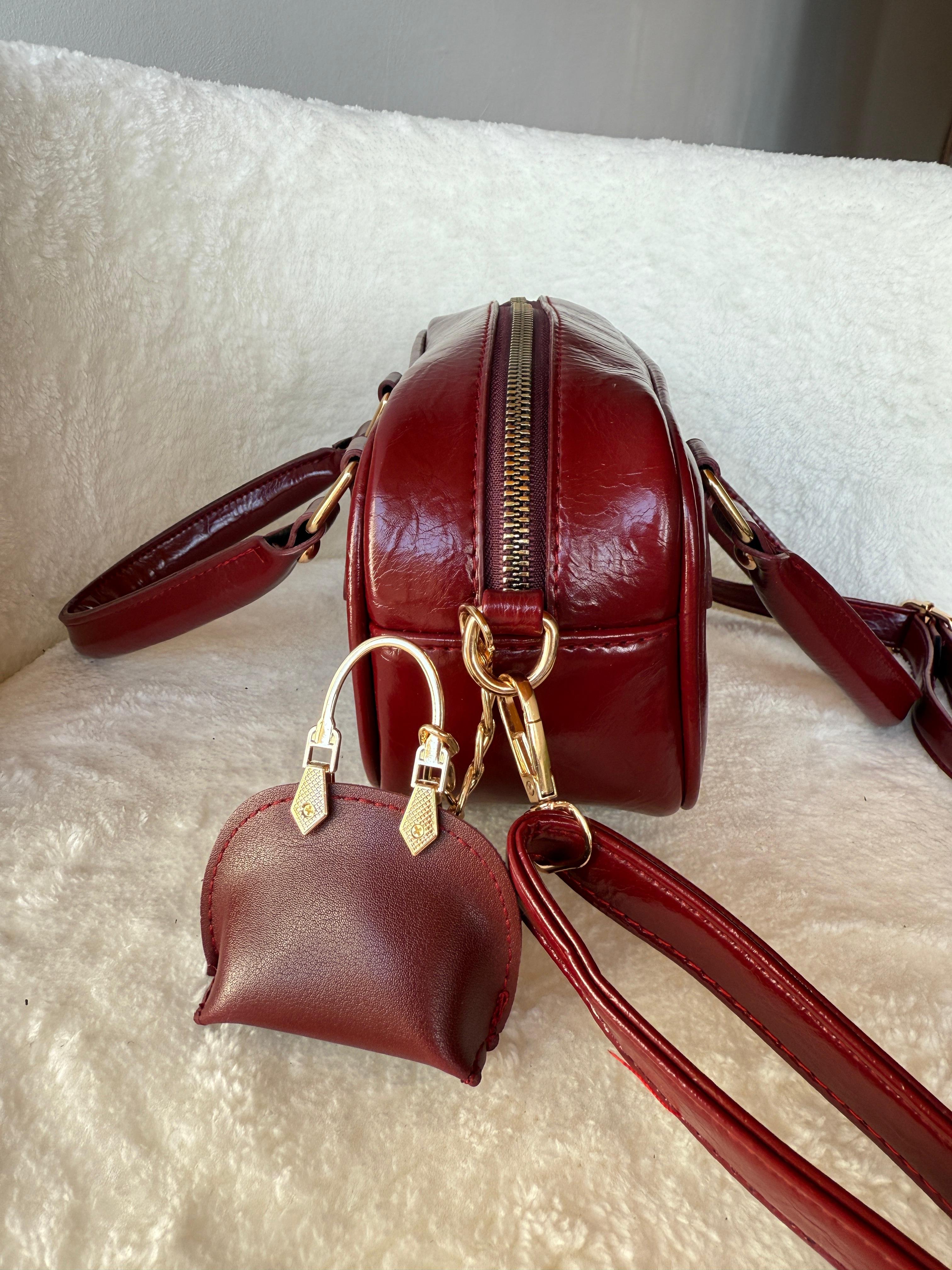 Celeste Model Bordo Charm Detaylı El ve Omuz Çantası