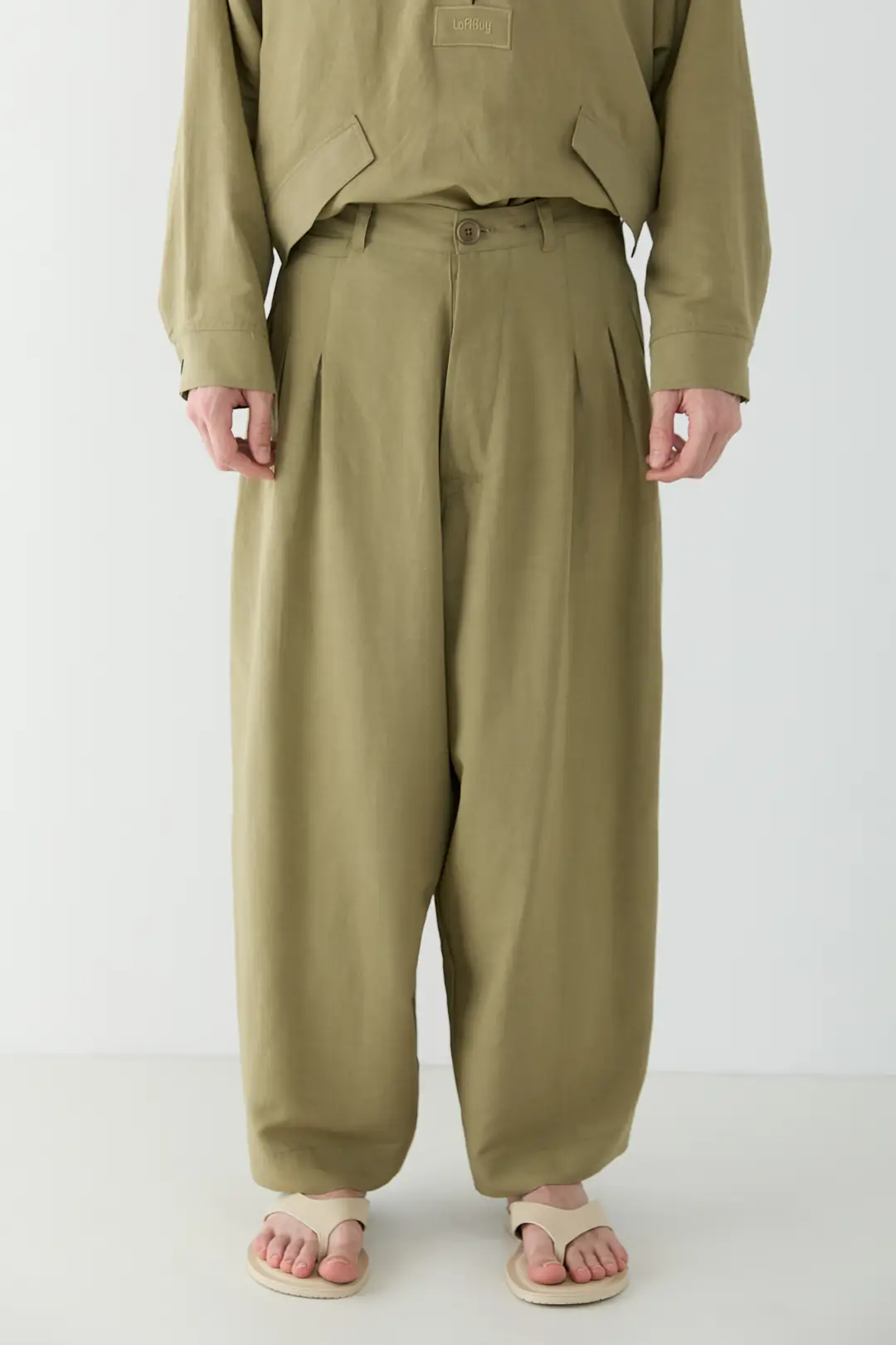 PİLE DETAYLI LİYOSEL KETEN PANTOLON · 2