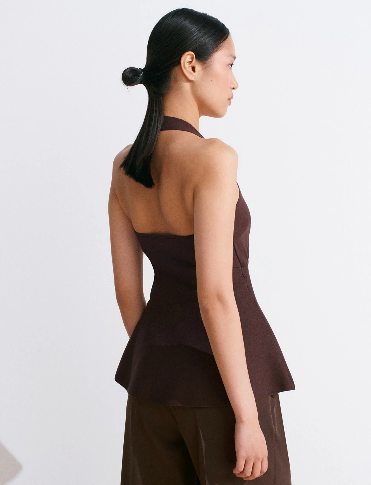 Metal Detaylı Peplum Triko Bluz