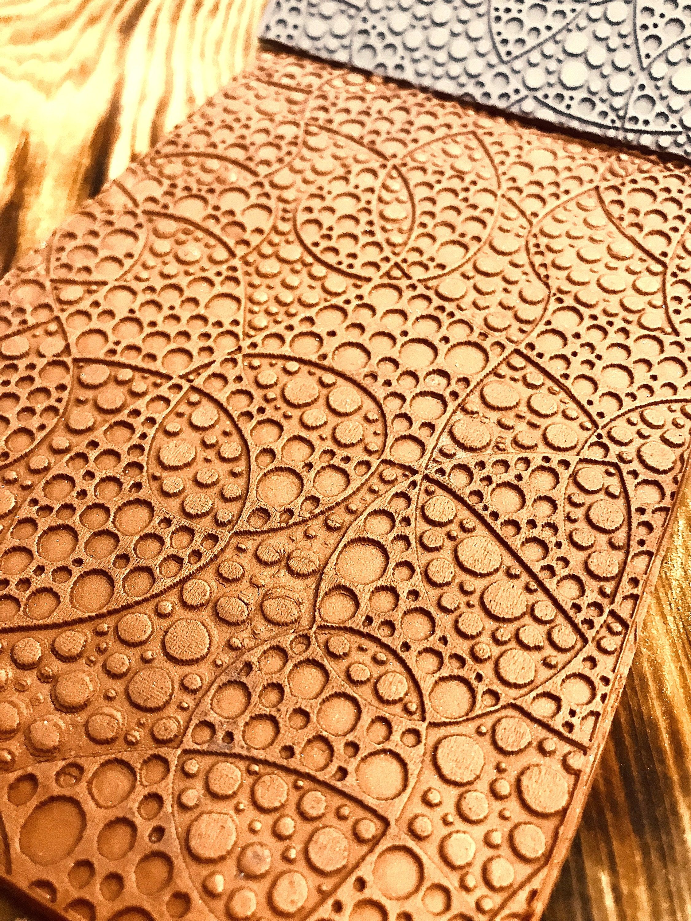 Round Geometric Rubber Texture Mat with a unique floral pattern in 10*14cm dimensions for polymer clay, ceramics , Polymer Clay Tools