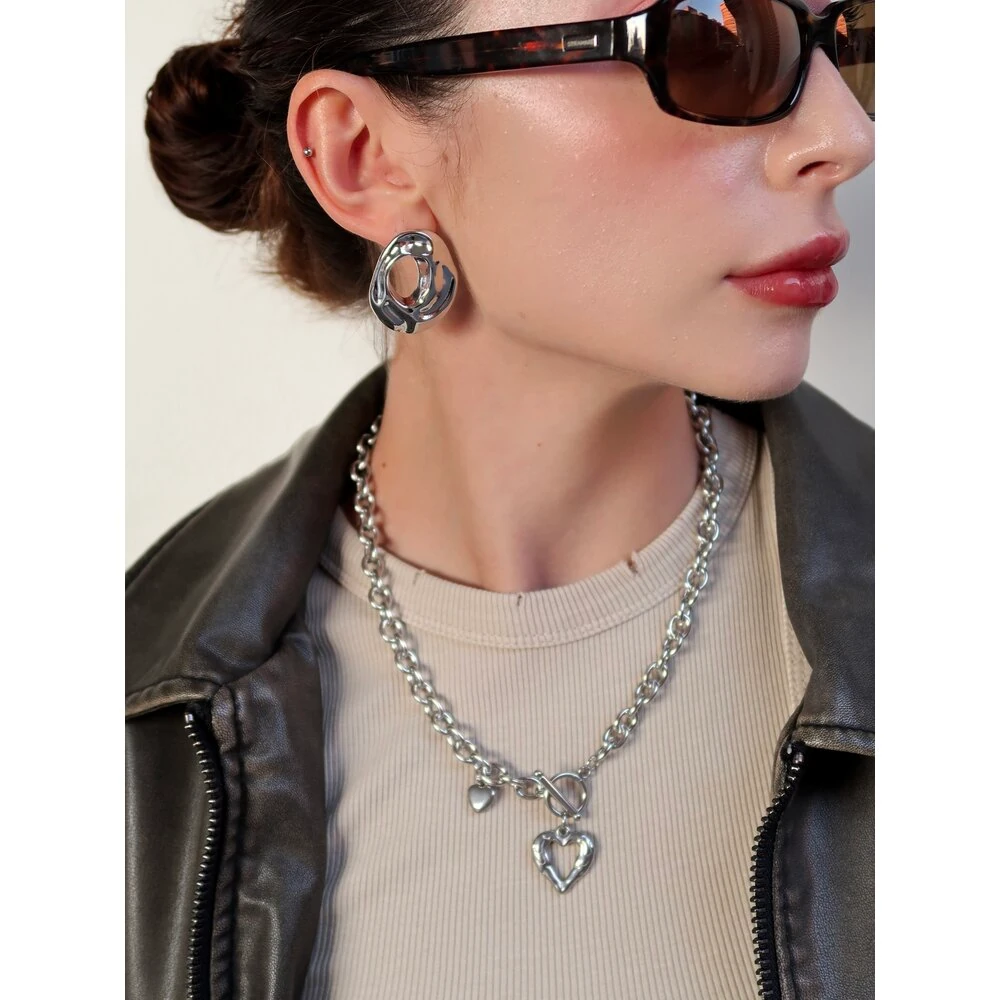 Hole Crumpled Oval Çelik Küpe