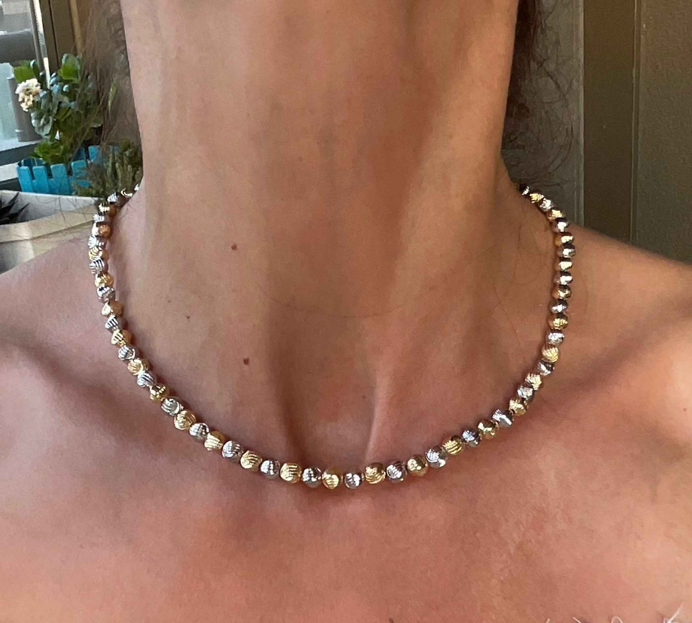 Gümüş ve gold renk karışık dorika model kolye