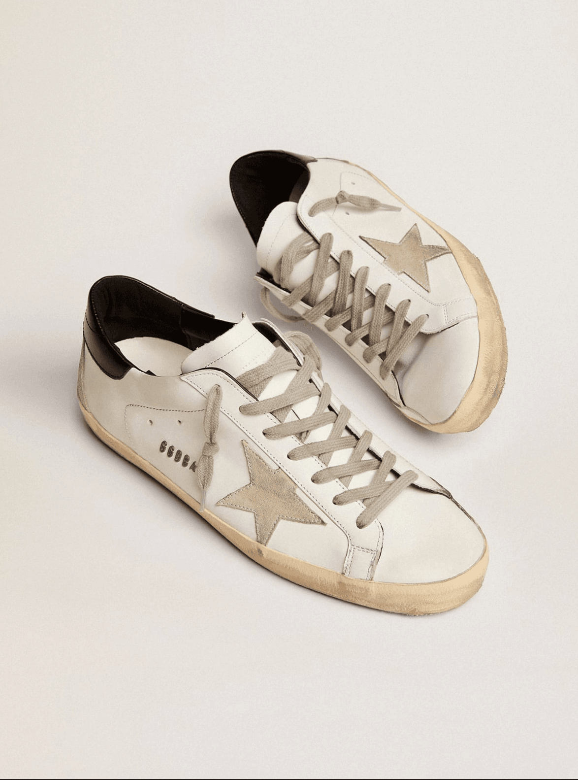Golden goose Men's Super-Star with black heel tab and metal stud lettering