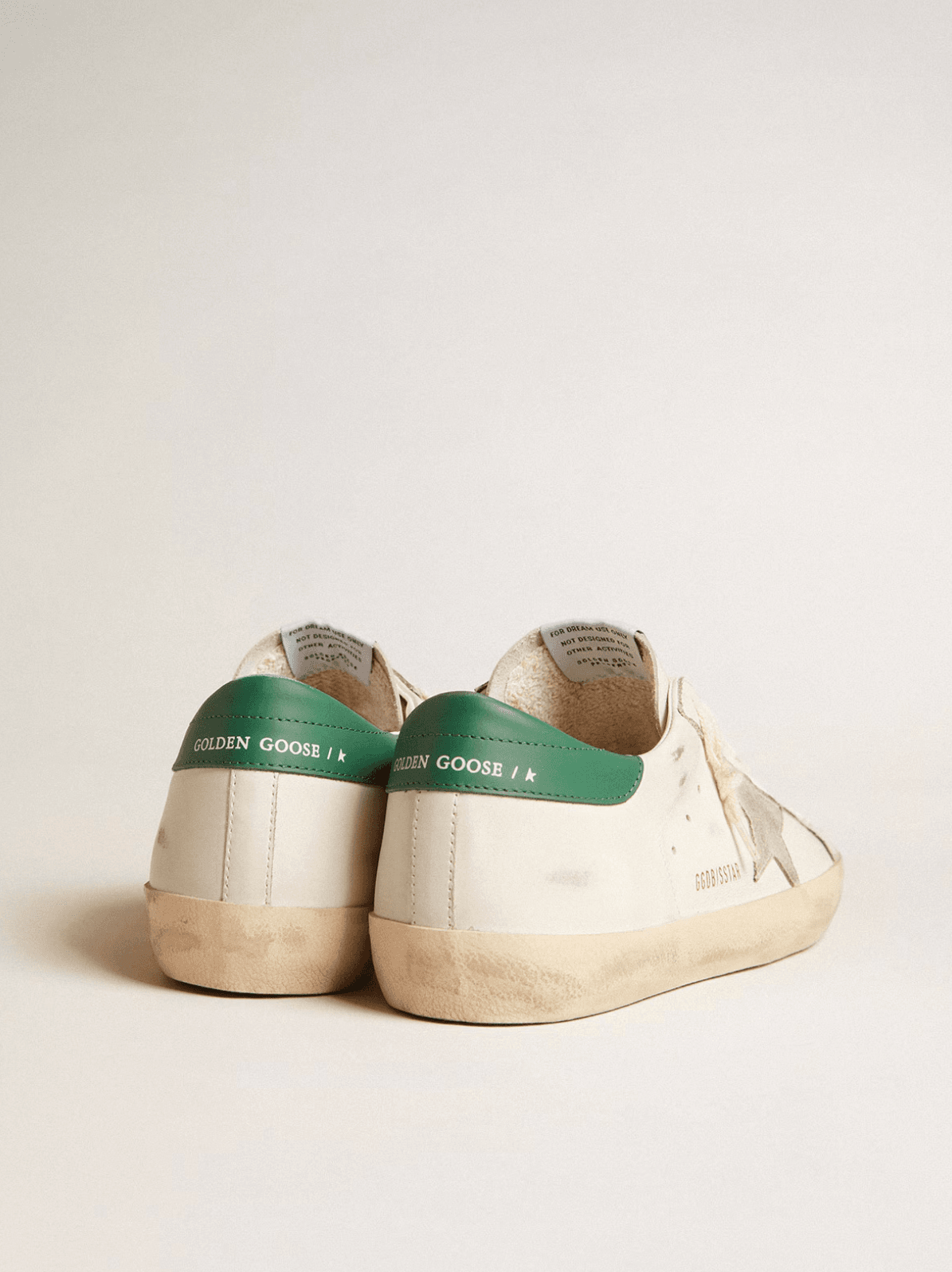 Golden goose Super-Star in white leather with ice-gray suede star and green leather heel tab Erkek