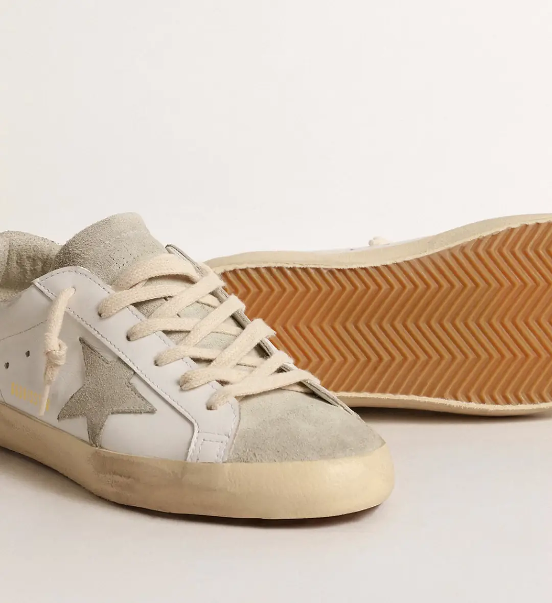 Golden Goose Super-Star with gray star and silver glitter heel tab