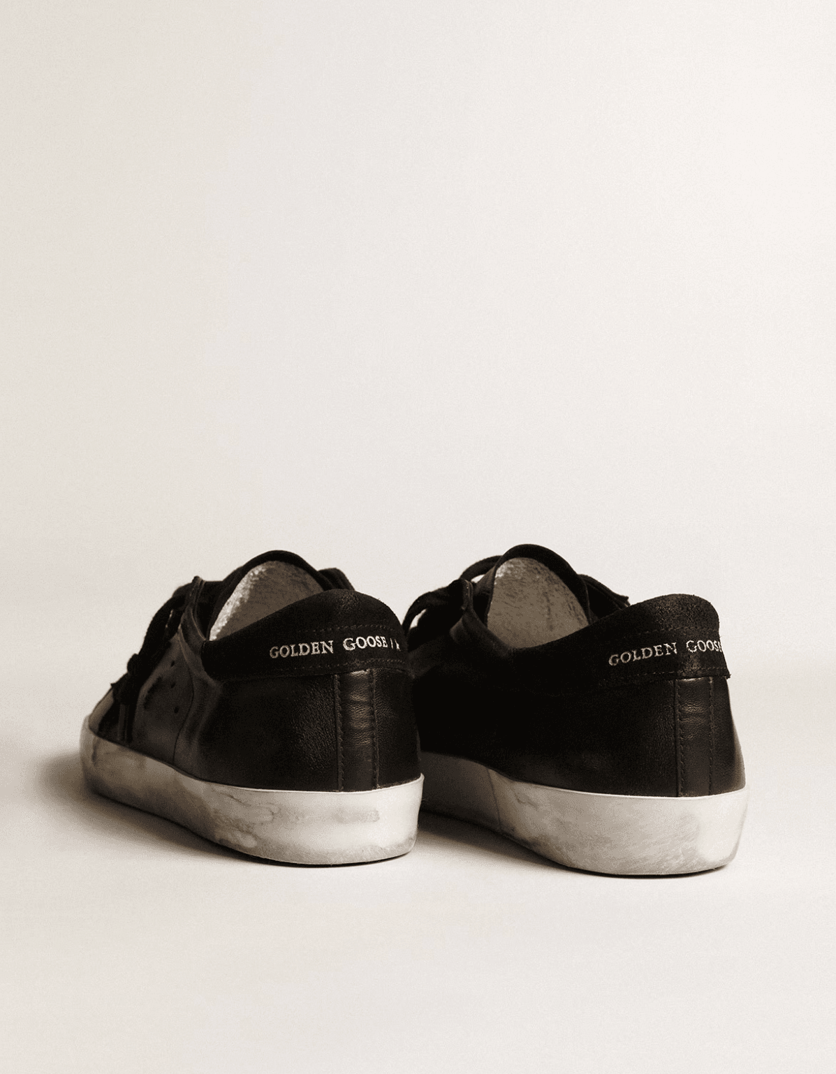 Golden goose Men's Super-Star in black nappa with black suede star and heel tab