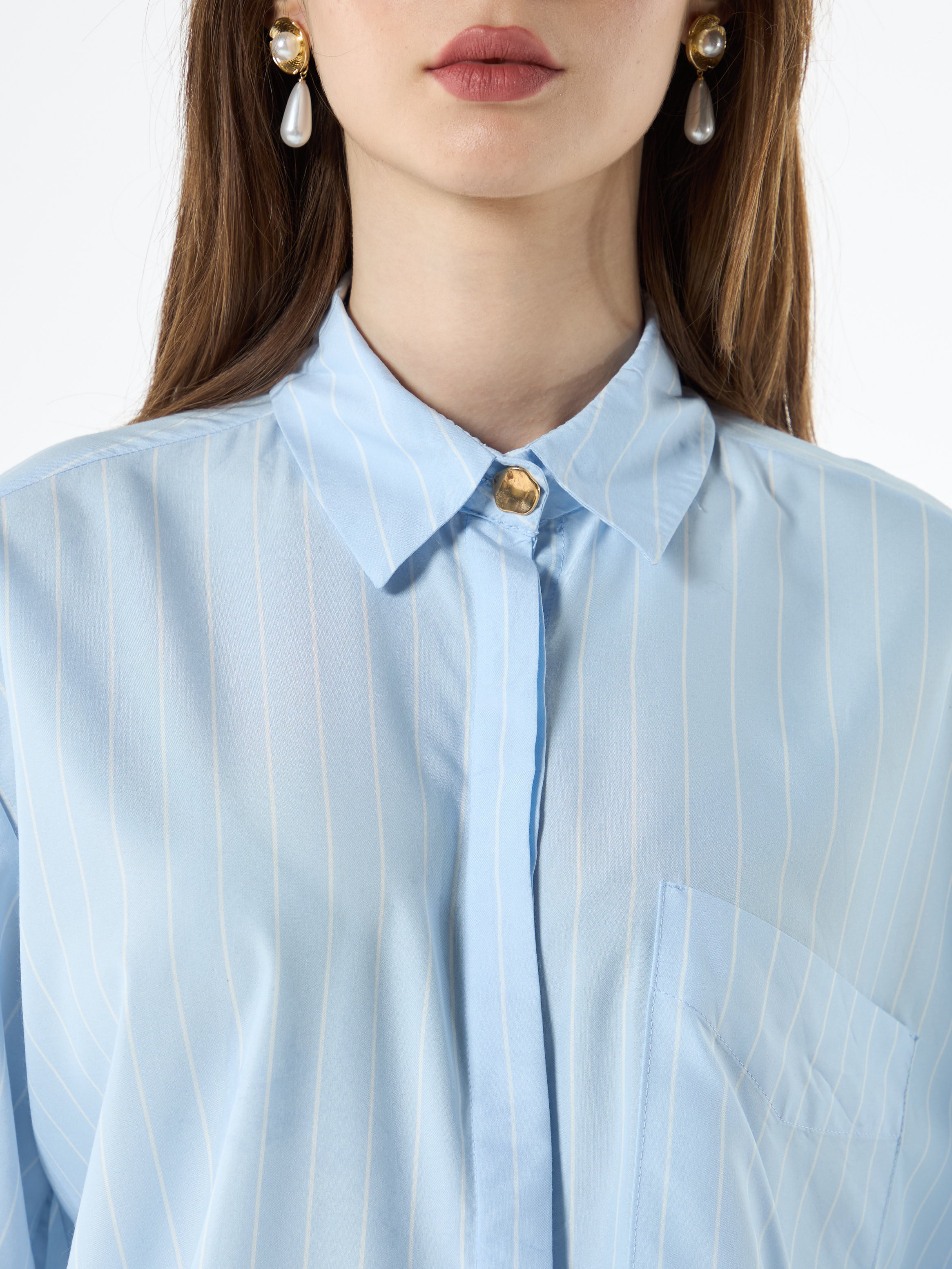 Striped shirt with gold buttons