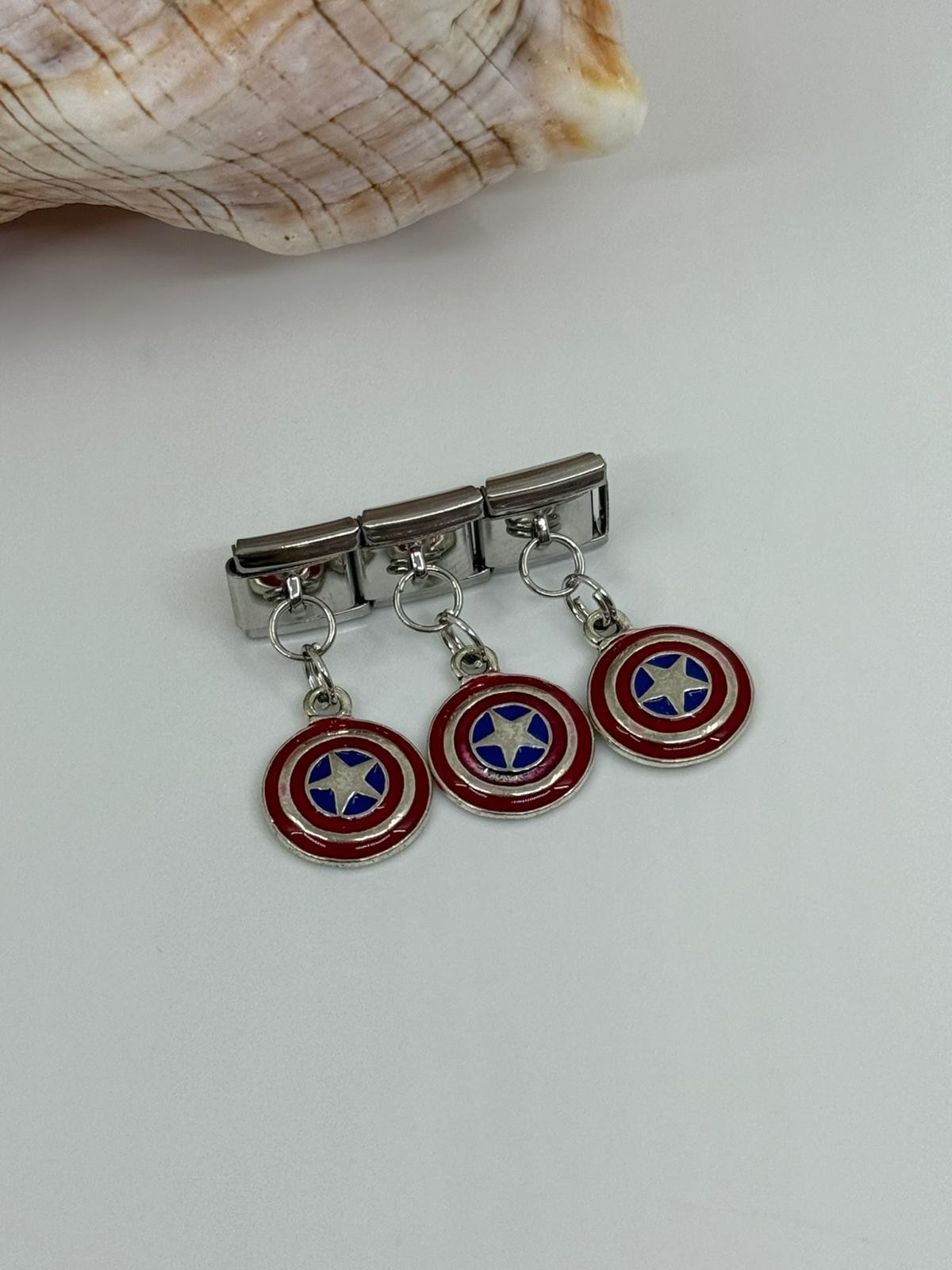 Nomi  Charm