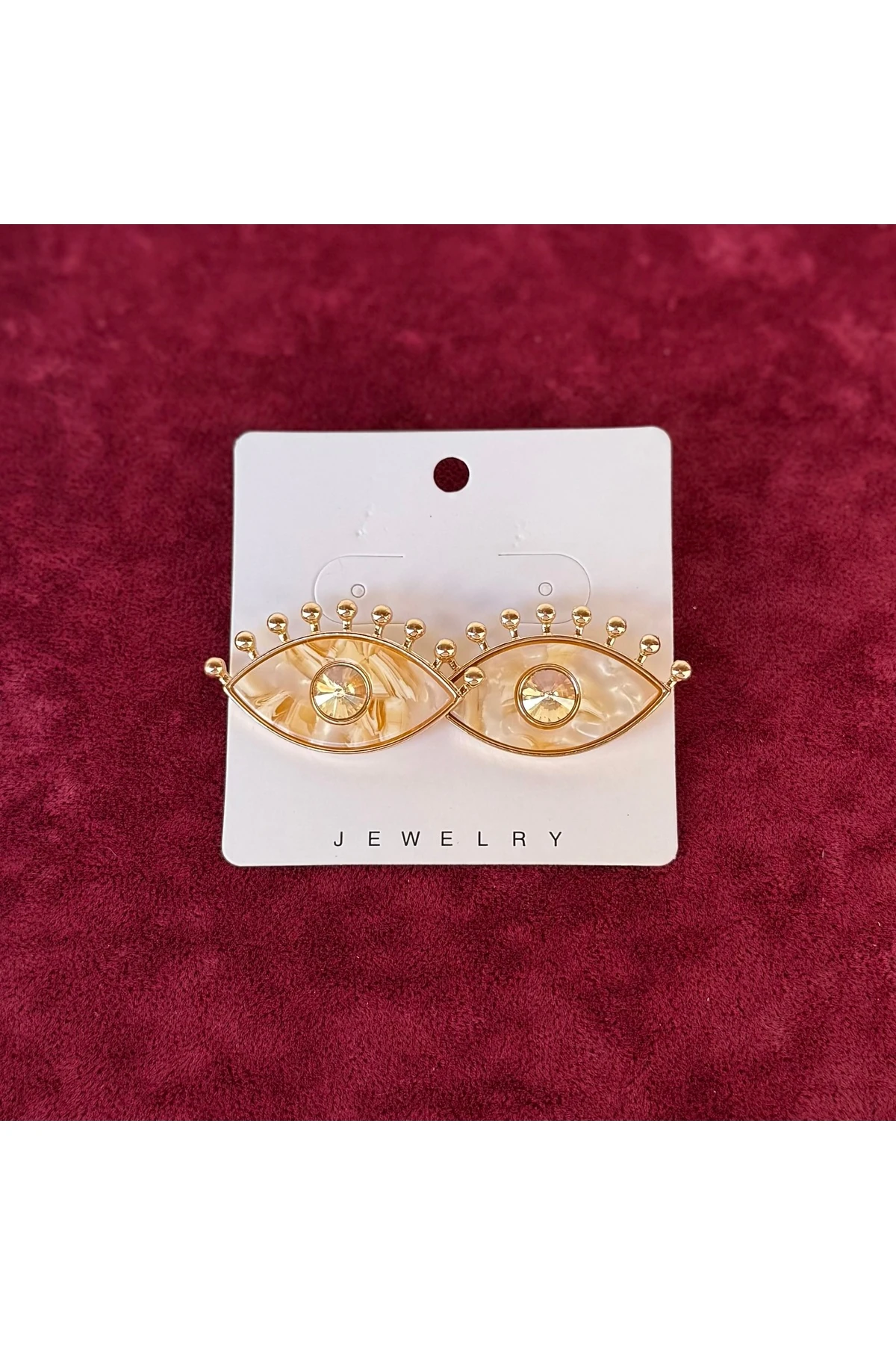 Altın Göz Figürlü Taş Detaylı Küpe – Mistik ve Modern Tasarım