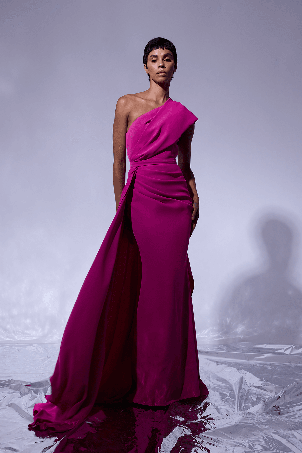 One-shoulder invitation dress with drape detail and extra removable skirt