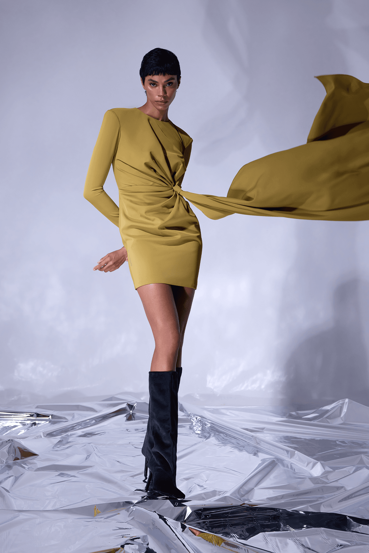 Form-fitting mini dress with draped waist