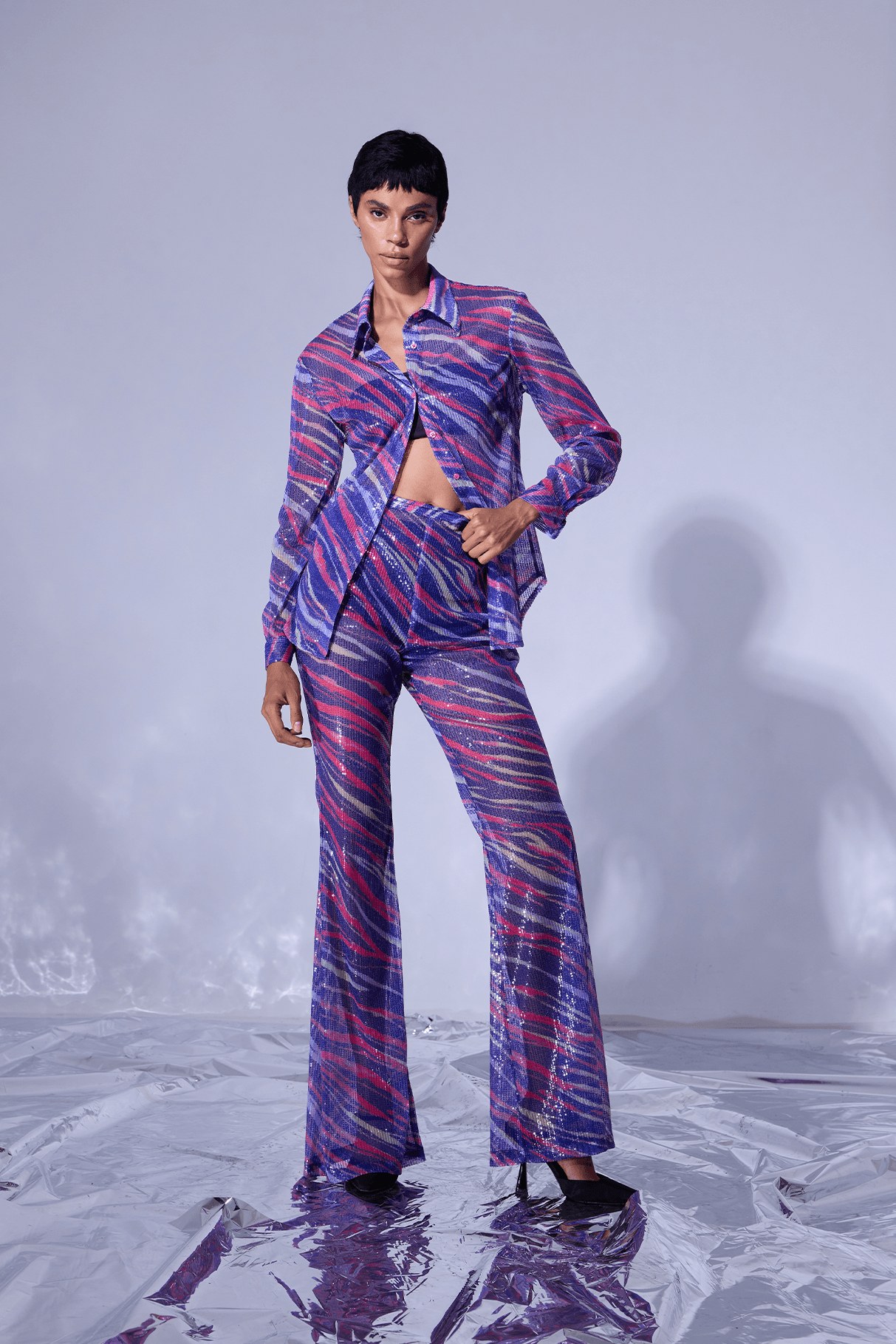 70's inspired women's trousers made of sequined fabric with zebra pattern