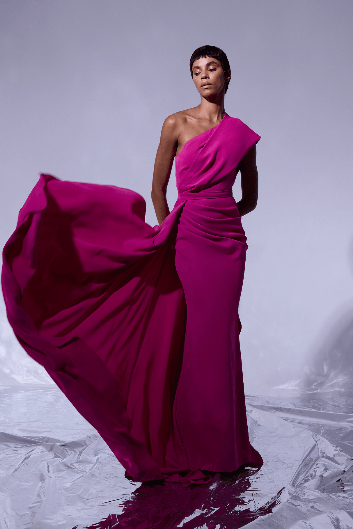 One-shoulder invitation dress with drape detail and extra removable skirt