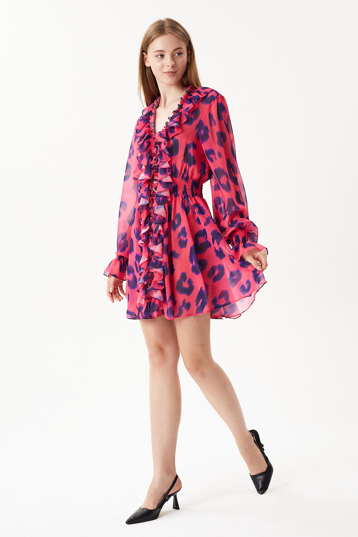 Relaxed fit mini chiffon dress with leopard pattern, ruffle detail, buttons on the front and elasticated waist.