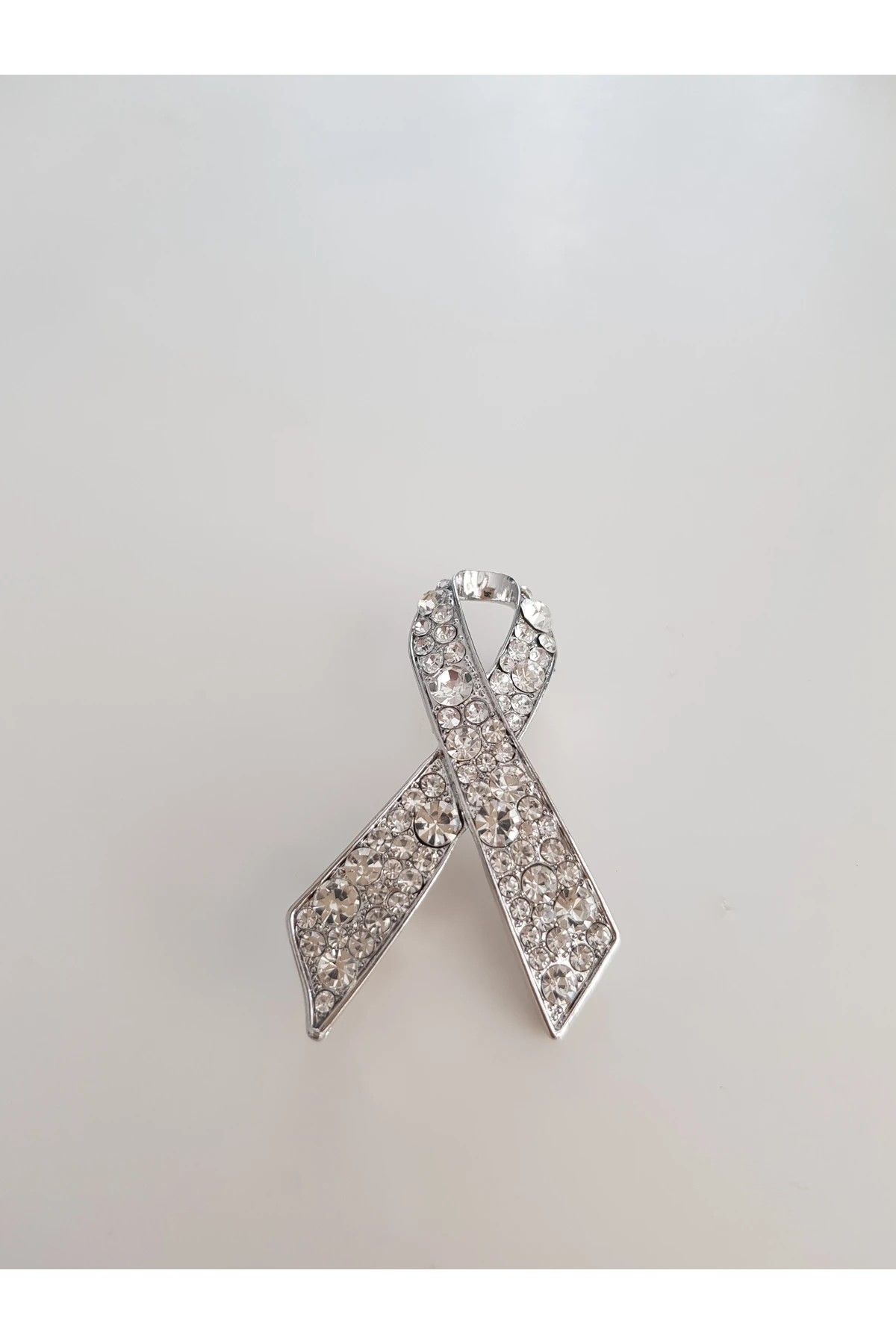 ZİRKON TAŞLI GÜMÜŞ KURDELE BROŞ
