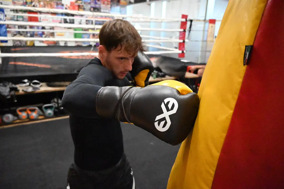 Breaking in leather boxing gloves on a heavy bag