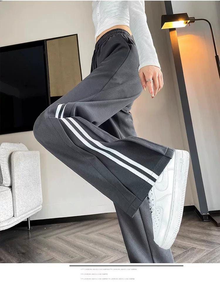 KIZ YANDAN ÇİZGİLİ CEPLİ PANTOLON