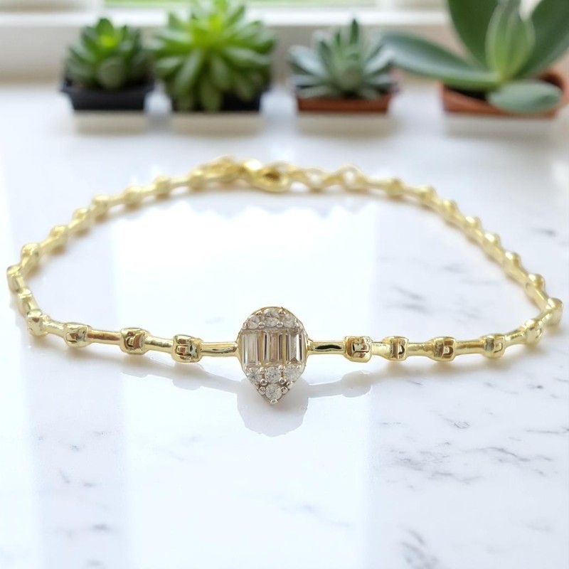 İnceliğin Damlası: G&A Jewels 925 Ayar Gümüş Damla Motifli Baget Taşlı Bileklik