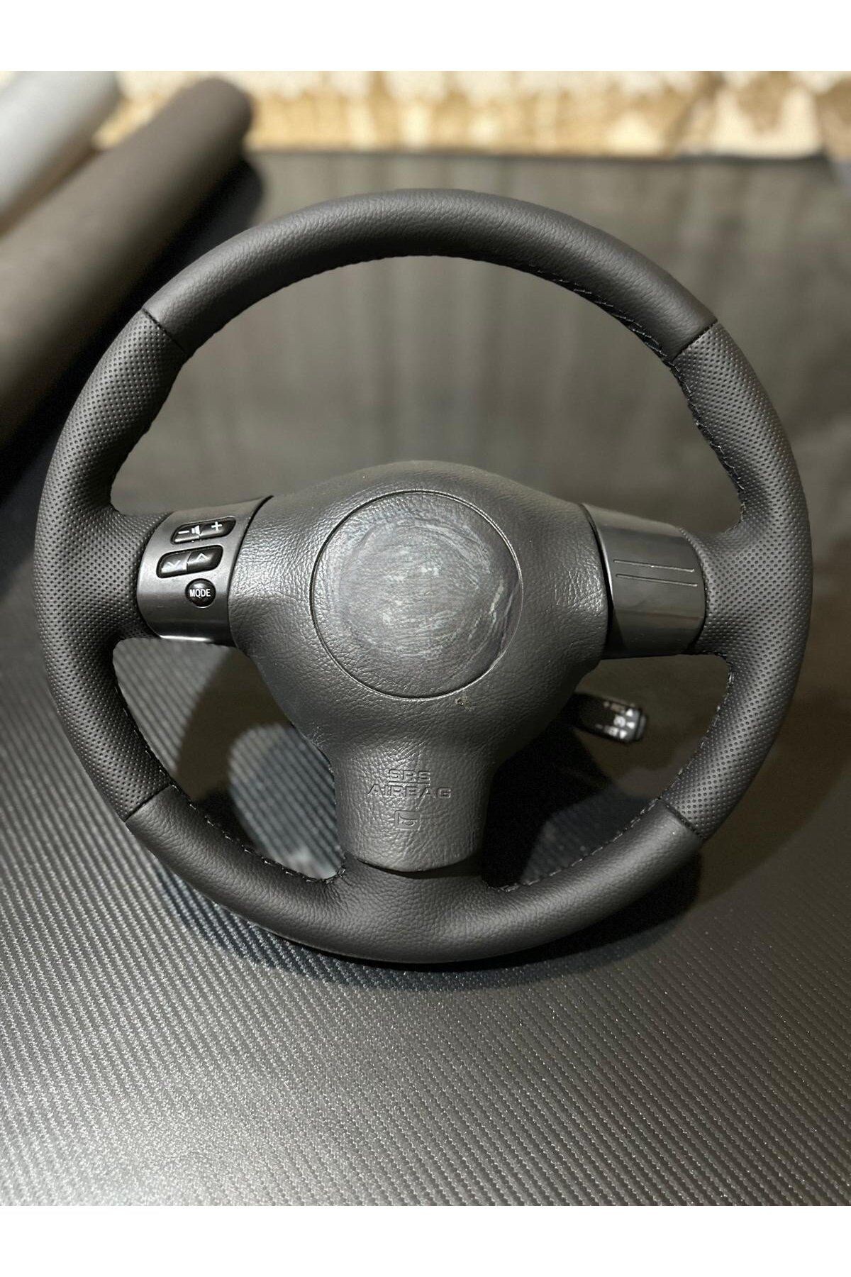 TOYOTA COROLLA SOL ARACA ÖZEL DERİ DİREKSİYON KILIFI (FABRİKASYON DERİ OLAN 2003-2007)