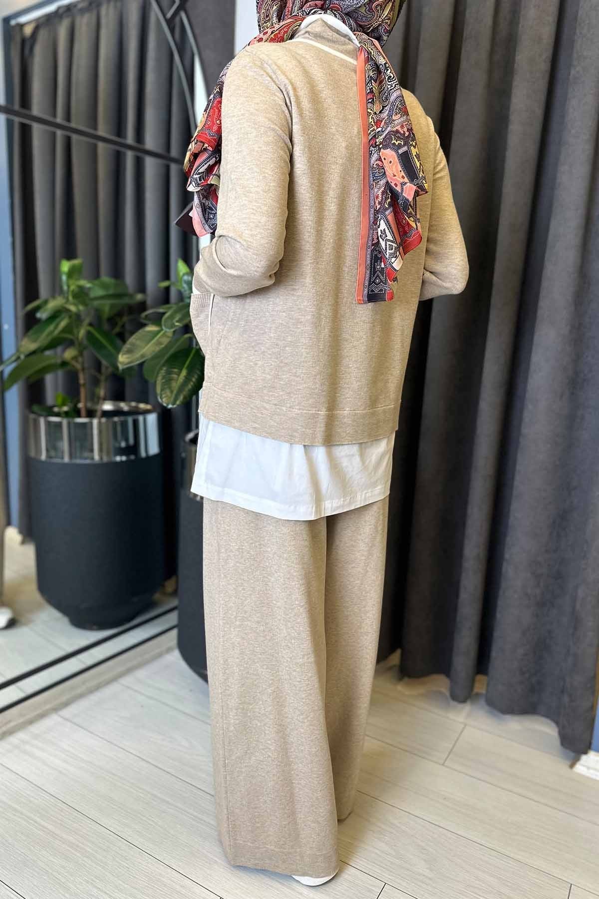 YAKASI BÜZGÜLÜ CEPLİ TRİKO TUNİK