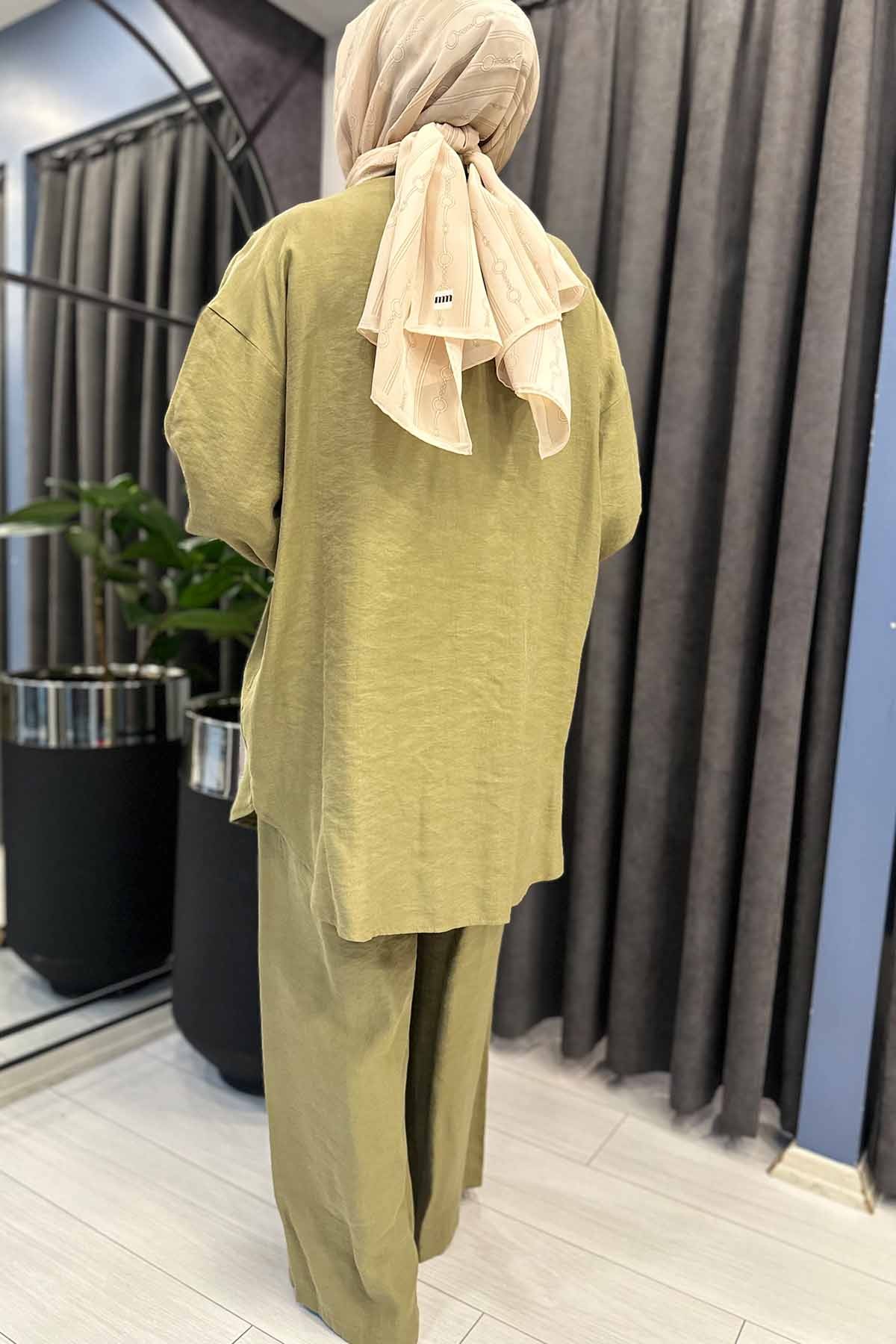 BELİ LASTİKLİ YANDAN UZUN KAPAKLI DÜĞMELİ BOL PAÇA PAISON PANTOLON