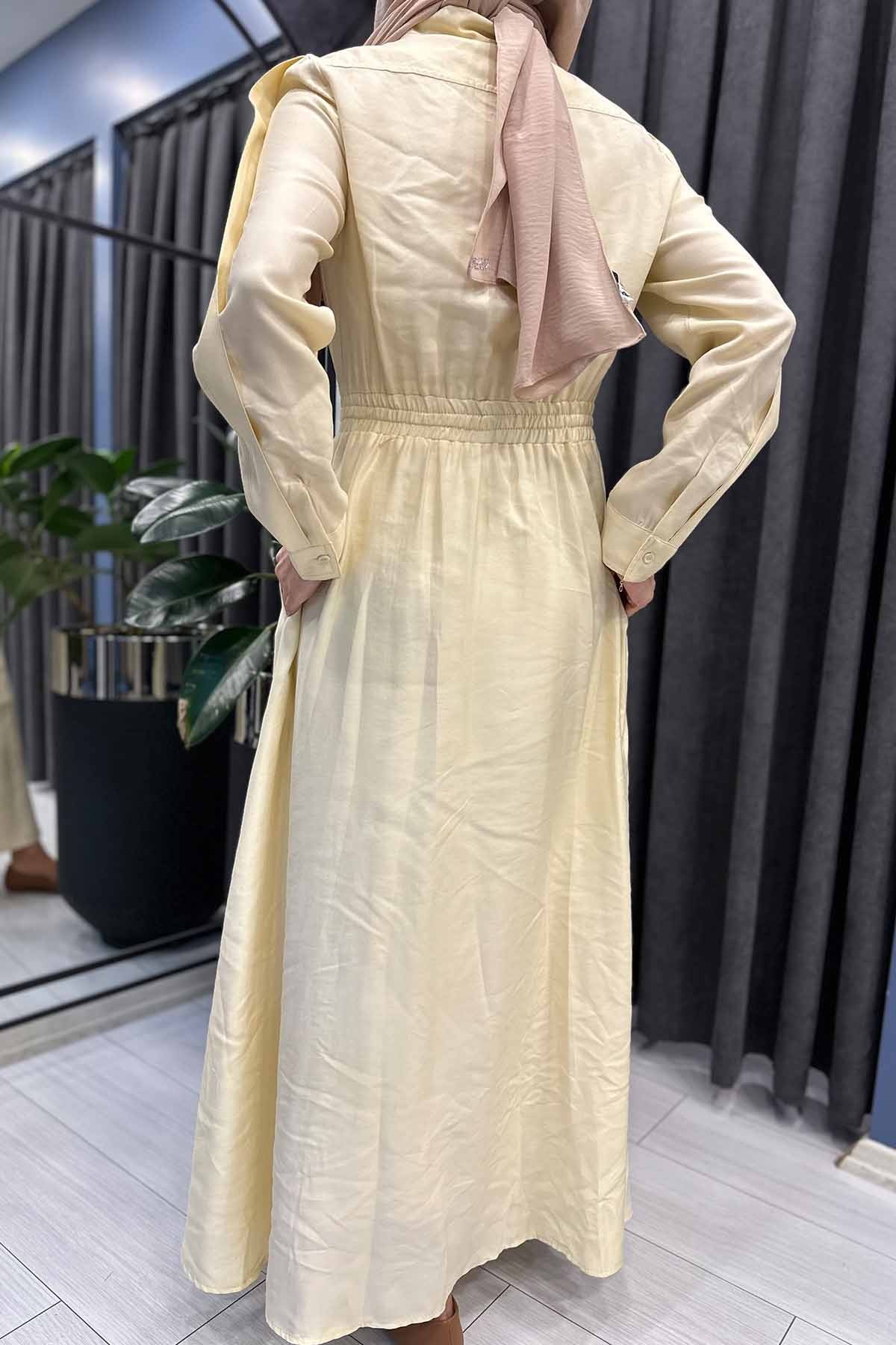 BELDEN BÜZGÜLÜ TEK CEBİ İŞLEMELİ TENCEL ELBİSE
