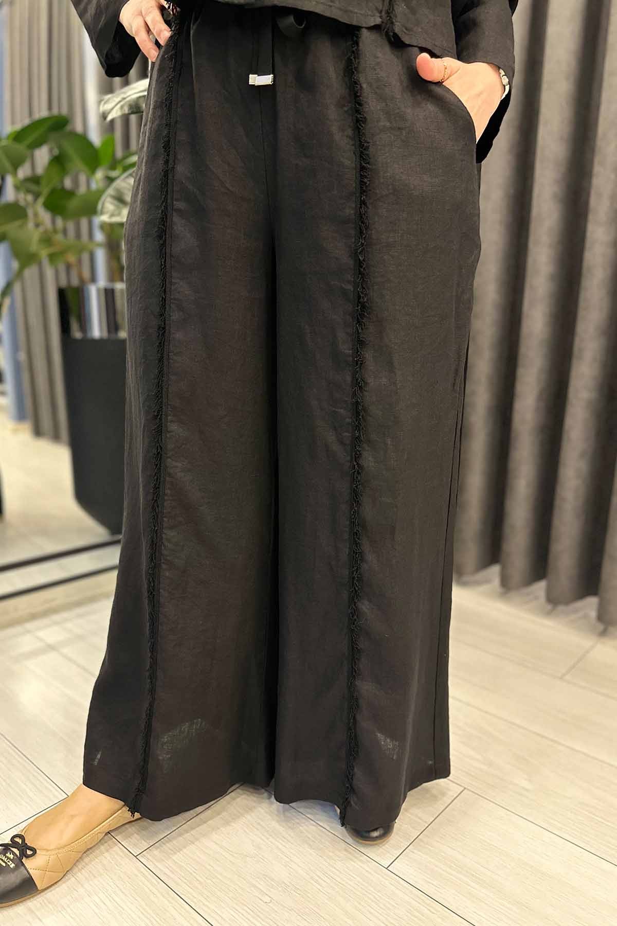 PÜSKÜL DETAYLI BOL PAÇA KETEN PANTOLON
