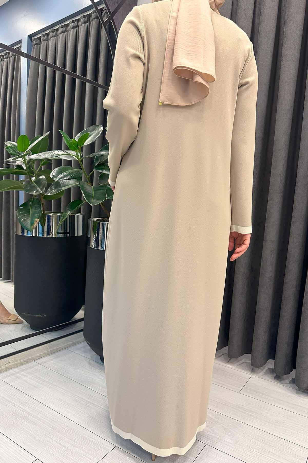 DÖRT DÜĞMELİ UZUN TRİKO ELBİSE