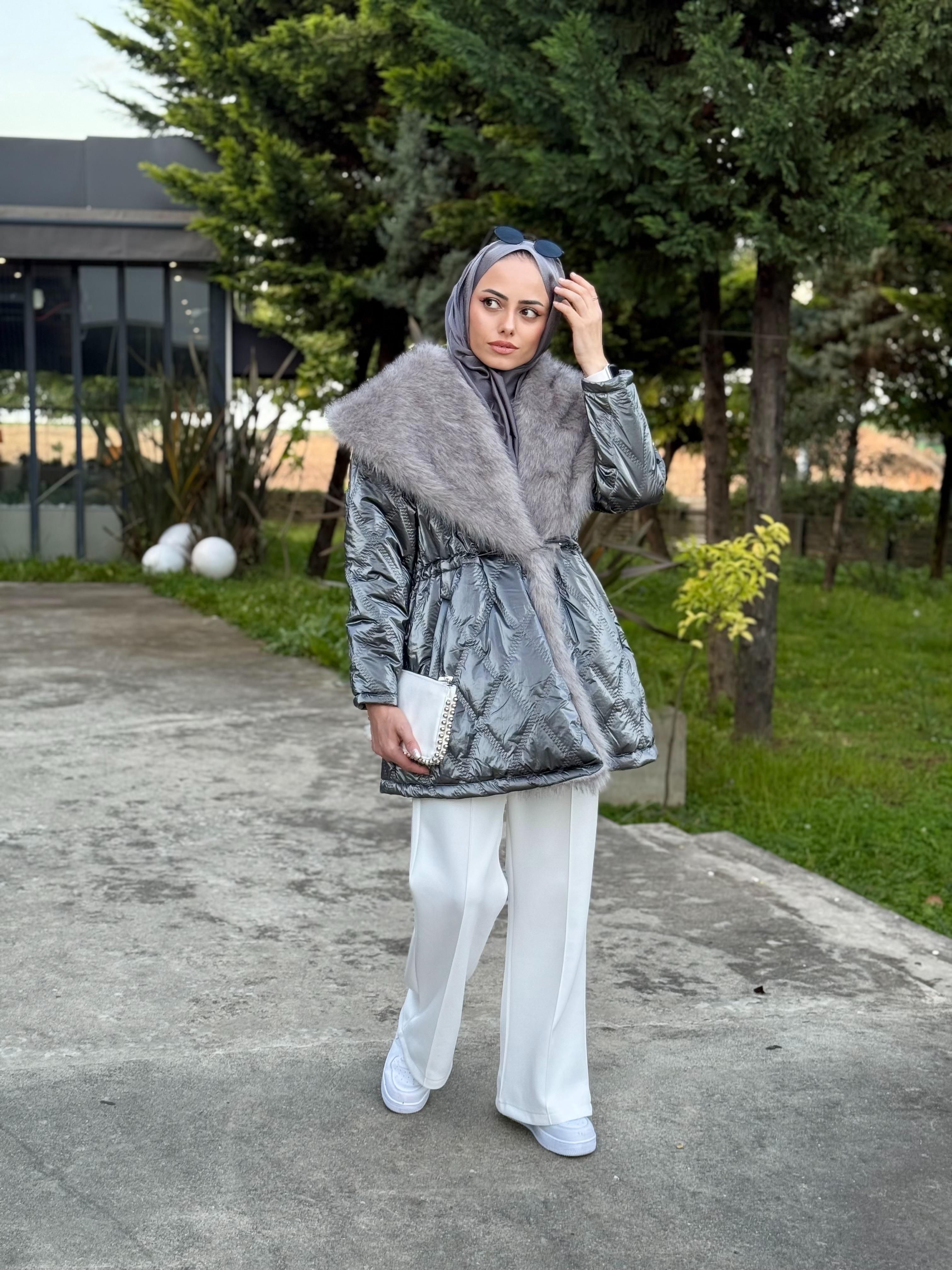 Beli Lastikli Kapitone Mont