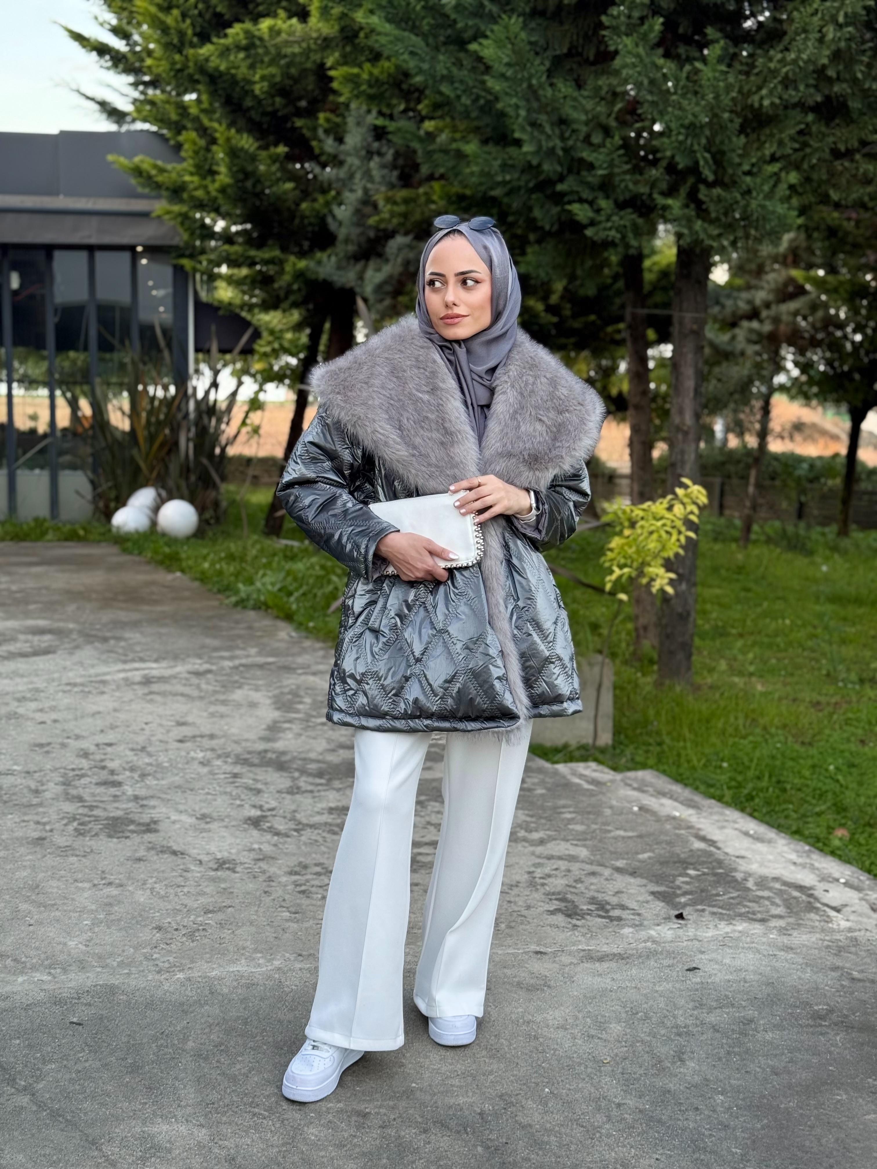 Beli Lastikli Kapitone Mont