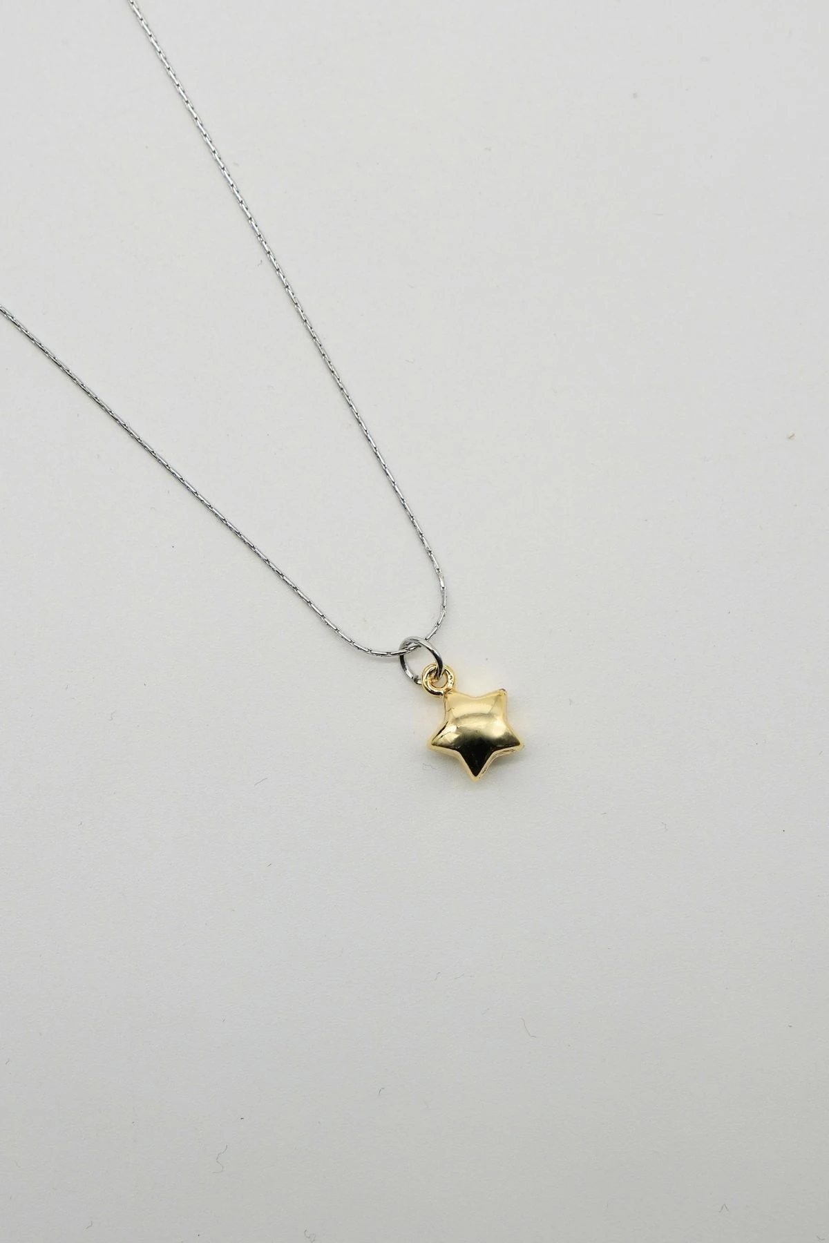 Çelik Minimal Şans Yıldız Kolye