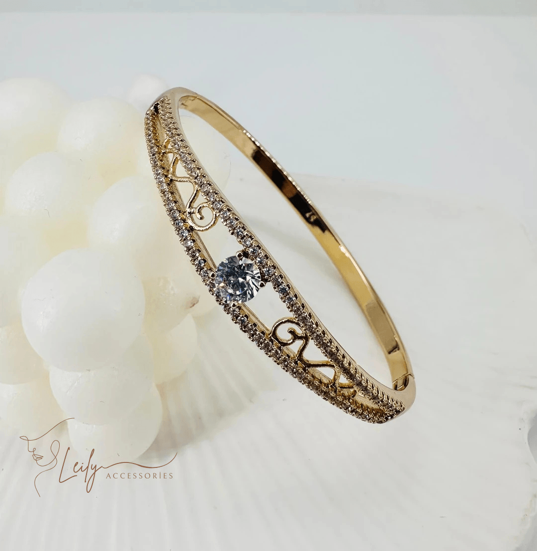Xuping Sarmal Desen Detaylı Zirkon Tek Taşlı 14 Ayar Gold Kelepçe