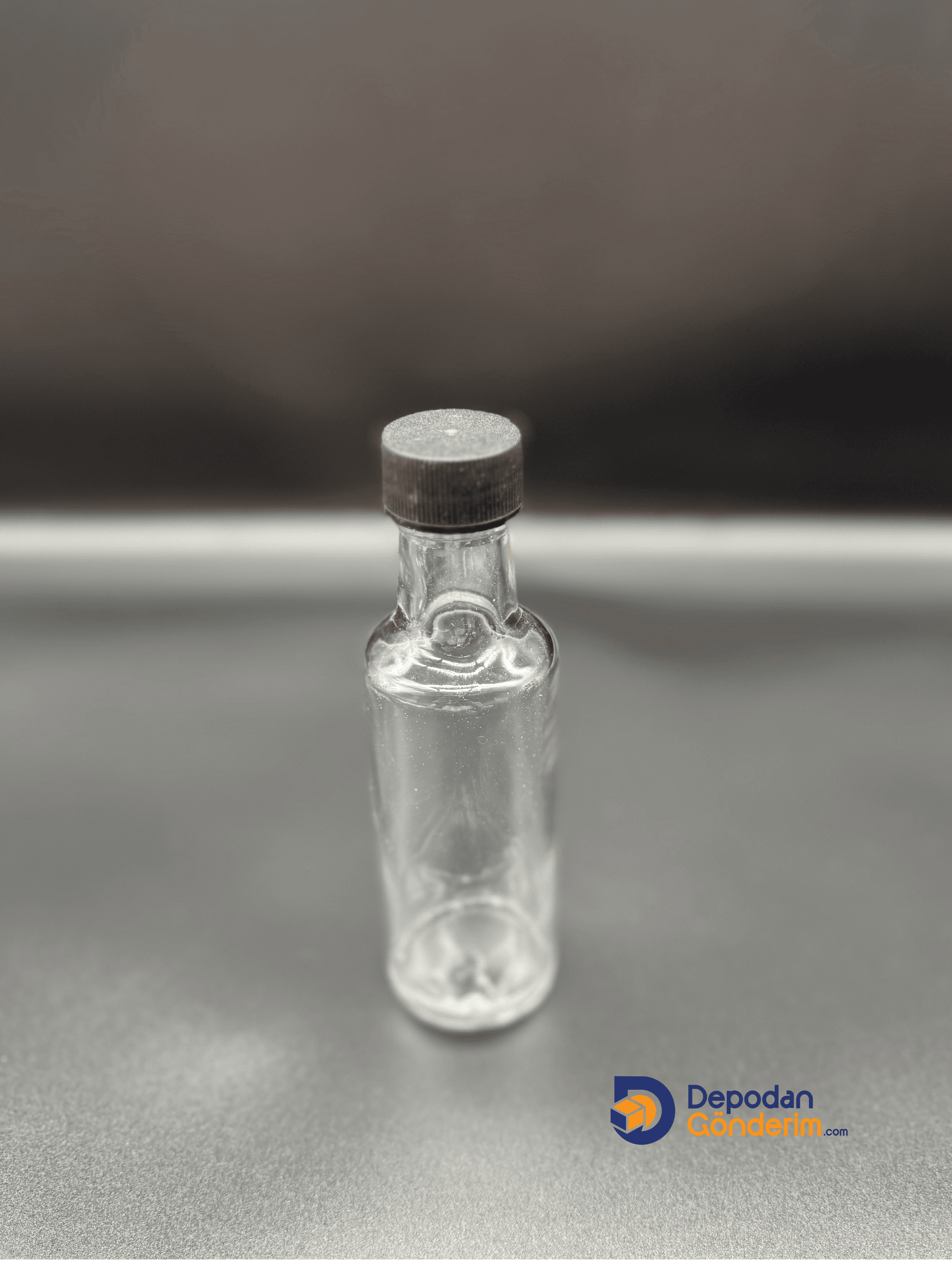 DP74 100cc ŞEFFAF DORİKA ŞİŞE - SİYAH KİLİTLİ KAPAKLI  